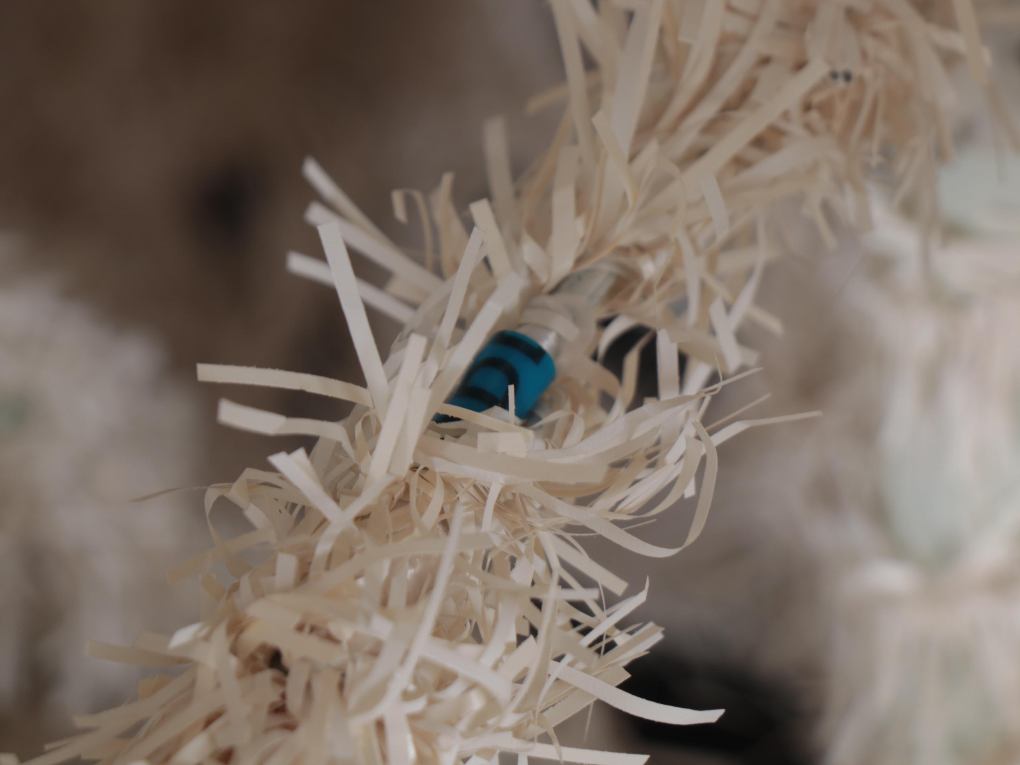 Large and Small Artificial Christmas Trees in White