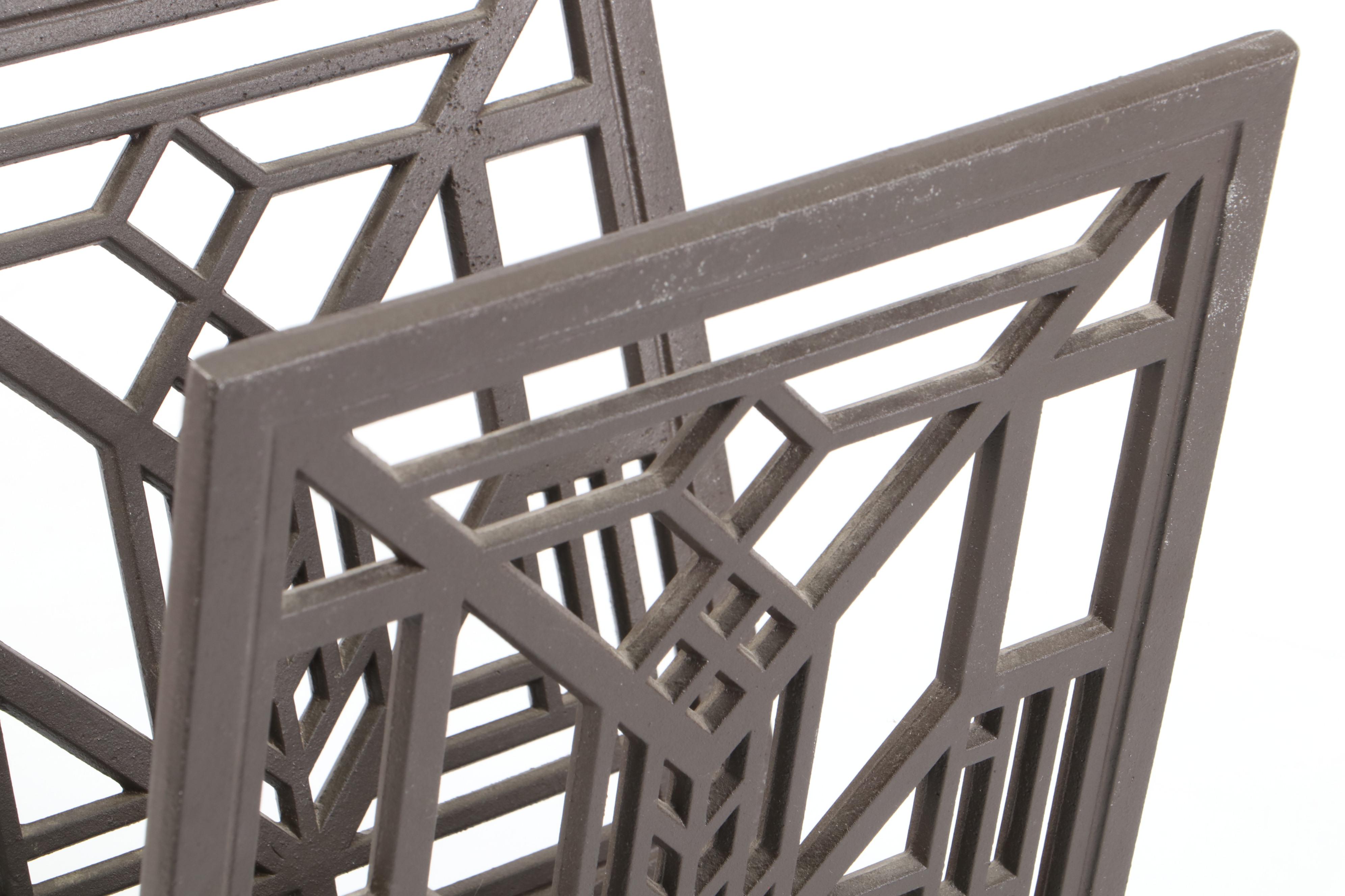 Frank Lloyd Wright Designed "Lake Geneva" Cast Iron Magazine Rack