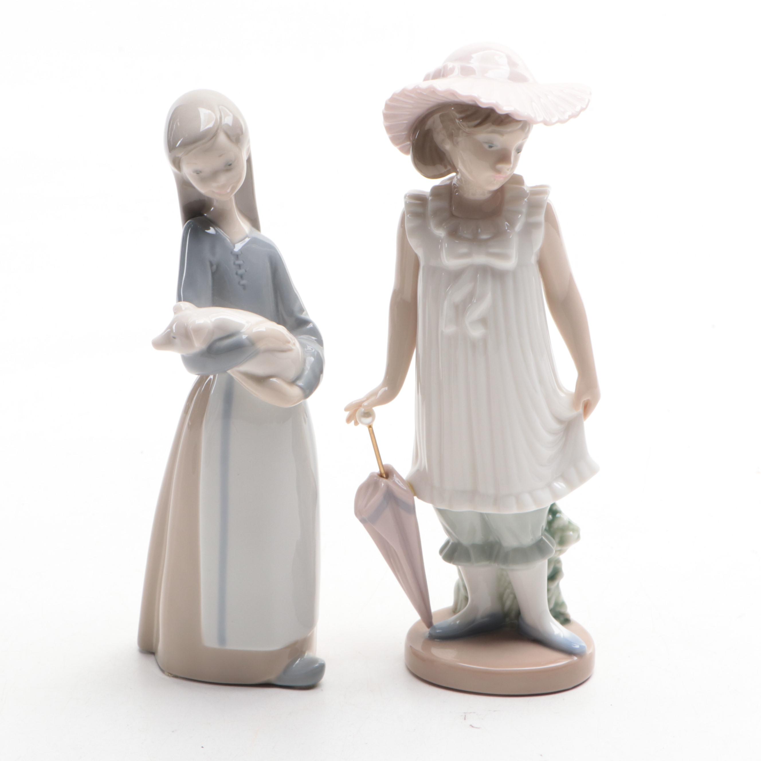 Lladró "Girl Holding Pig" with Nao by Lladró "April Showers" and Geese Figurines