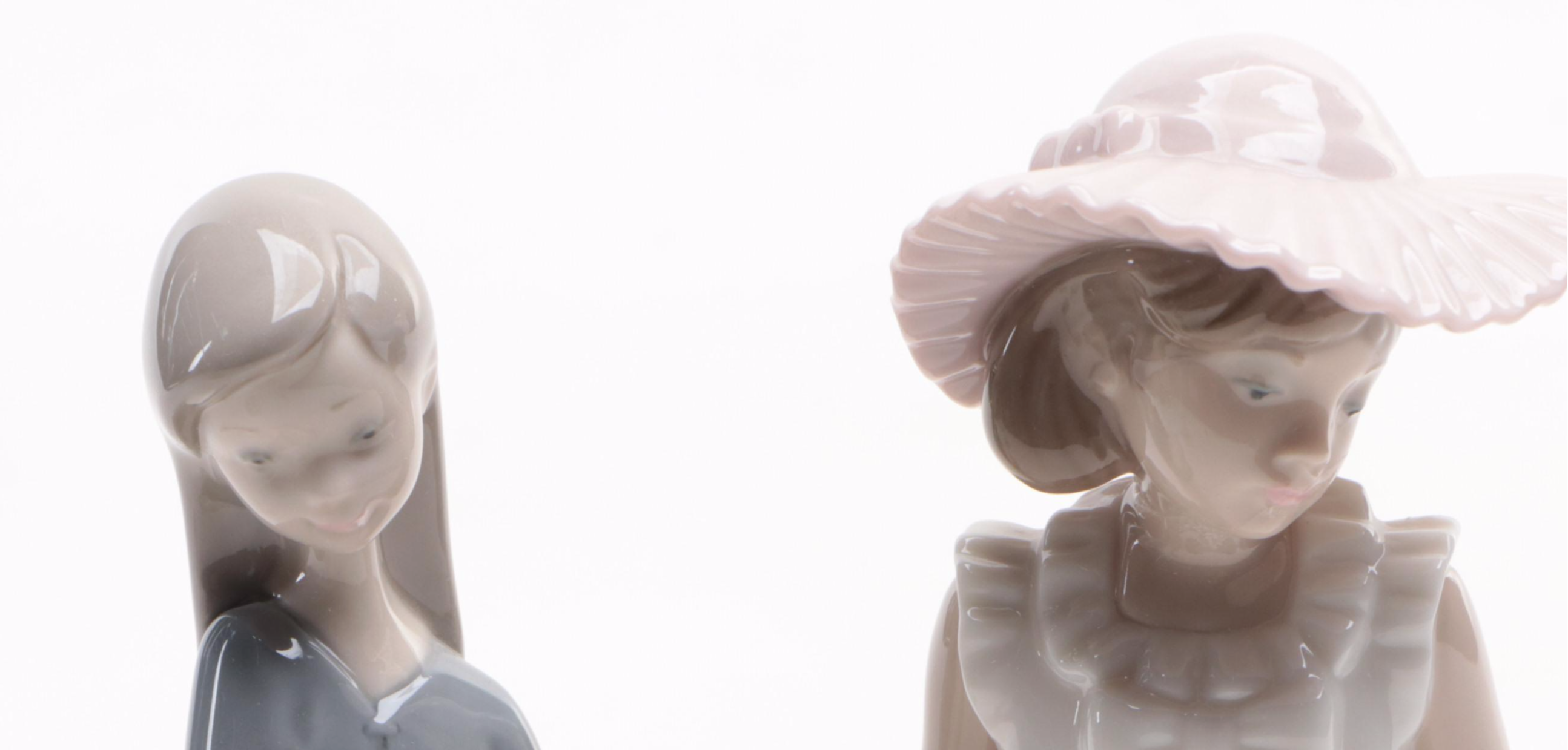 Lladró "Girl Holding Pig" with Nao by Lladró "April Showers" and Geese Figurines