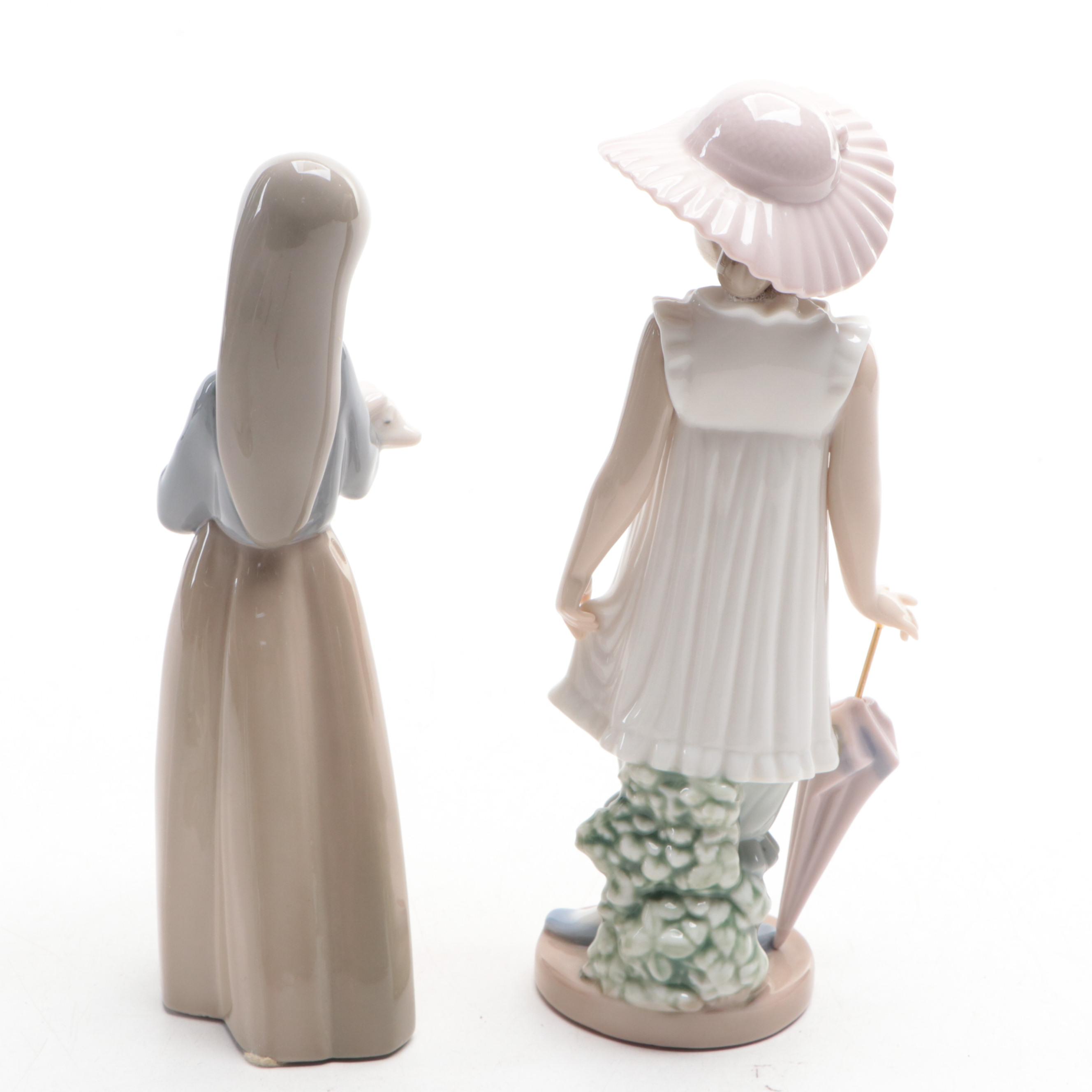 Lladró "Girl Holding Pig" with Nao by Lladró "April Showers" and Geese Figurines