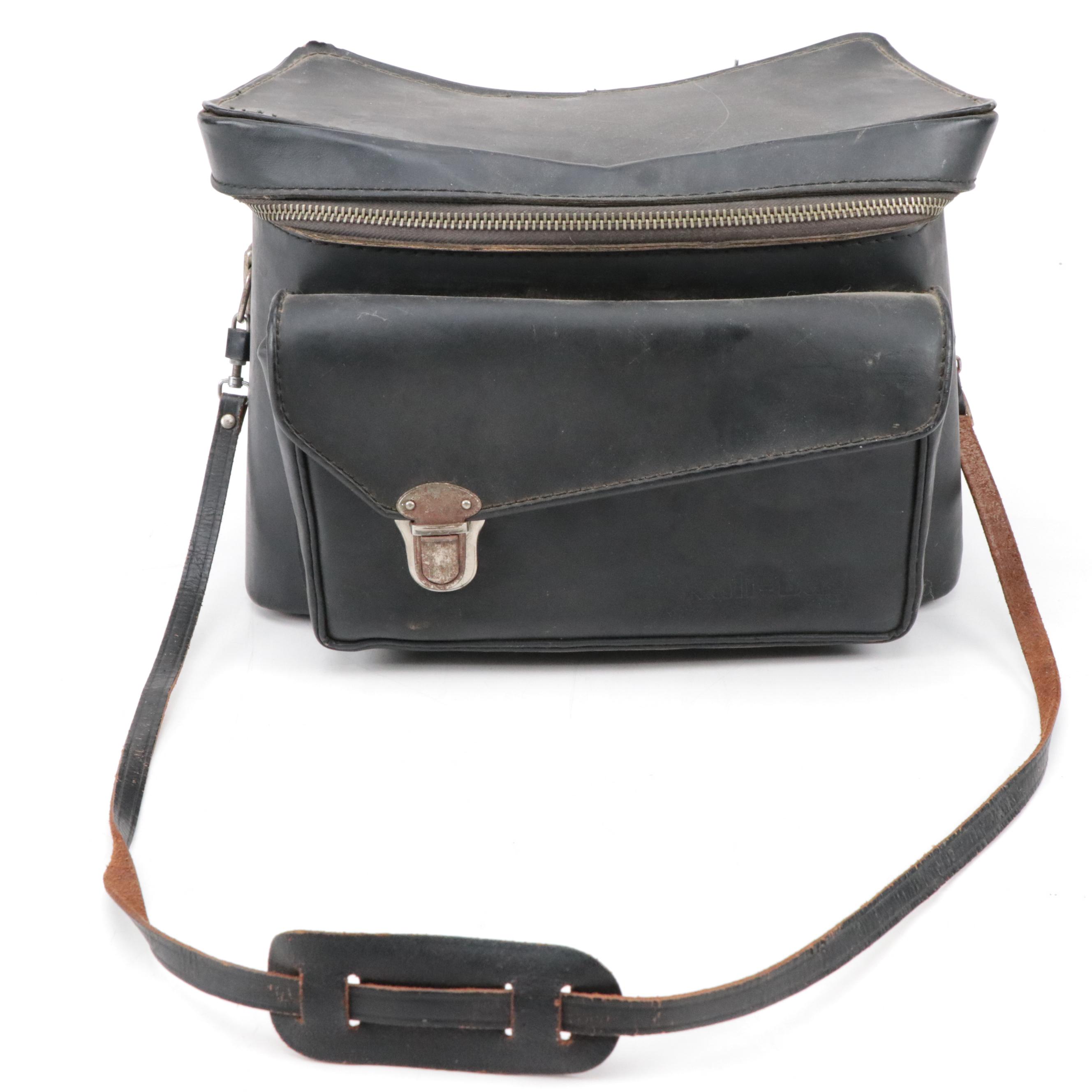 Nikon EM SLR Camera w/ Vivitar 55mm Macro Lens, Nikon Skylight Lens & Camera Bag