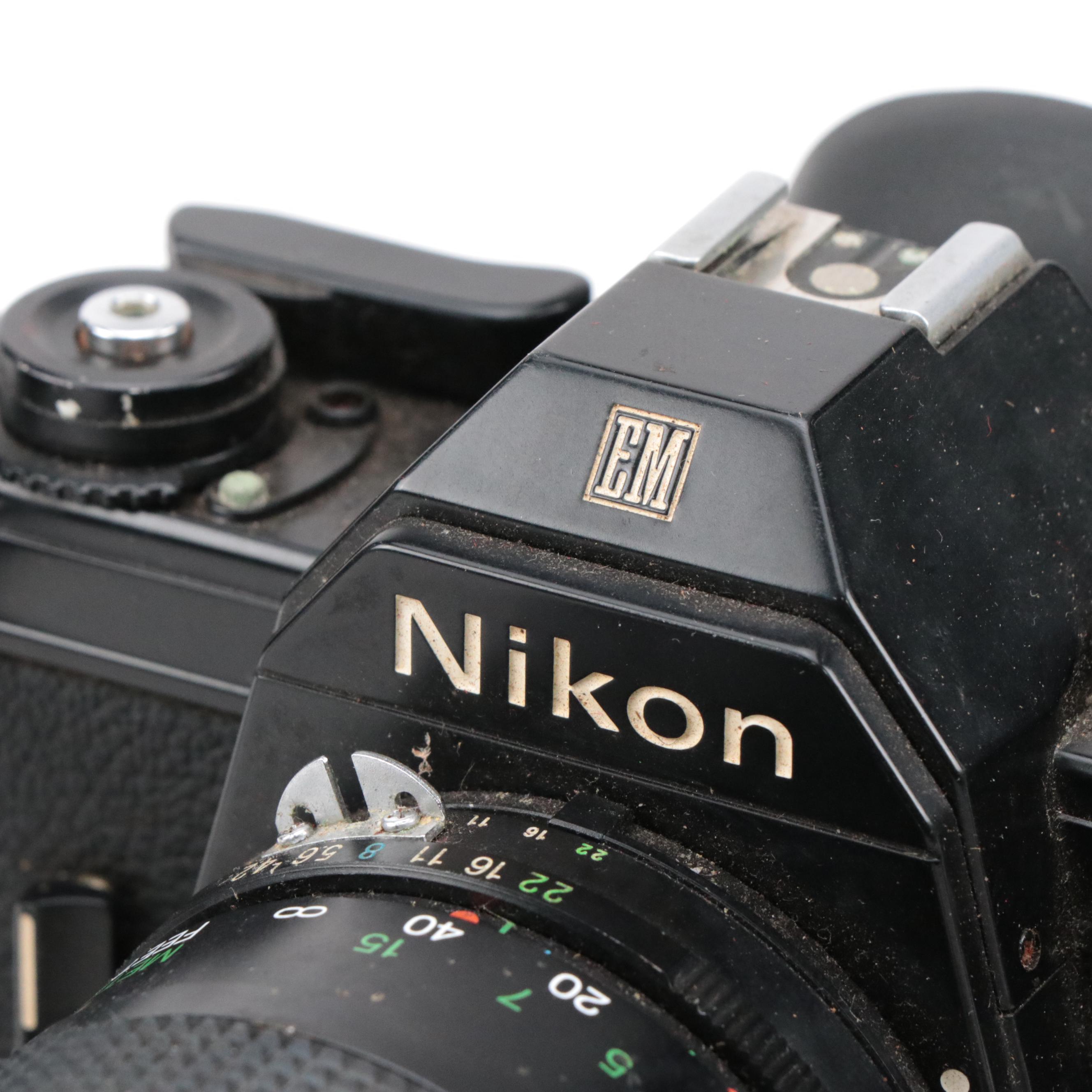 Nikon EM SLR Camera w/ Vivitar 55mm Macro Lens, Nikon Skylight Lens & Camera Bag