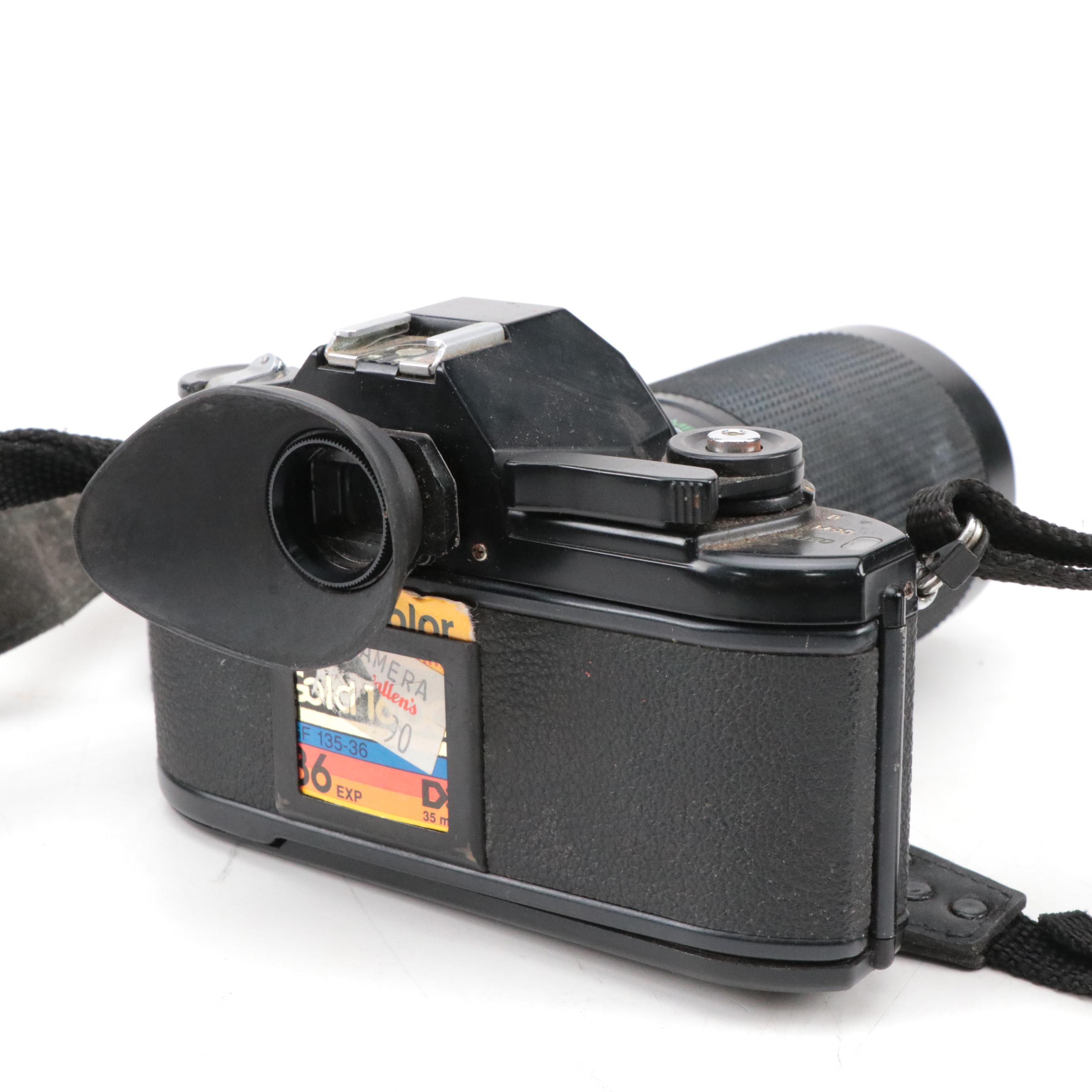 Nikon EM SLR Camera w/ Vivitar 55mm Macro Lens, Nikon Skylight Lens & Camera Bag