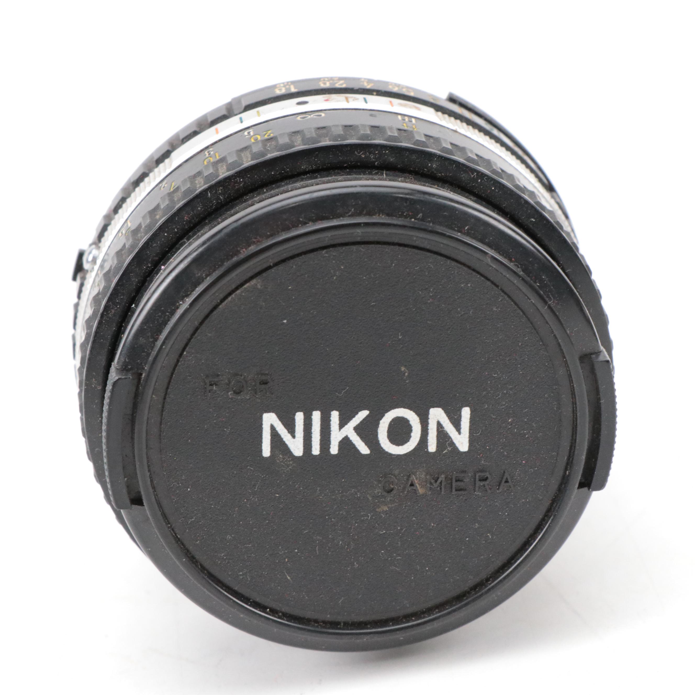 Nikon EM SLR Camera w/ Vivitar 55mm Macro Lens, Nikon Skylight Lens & Camera Bag