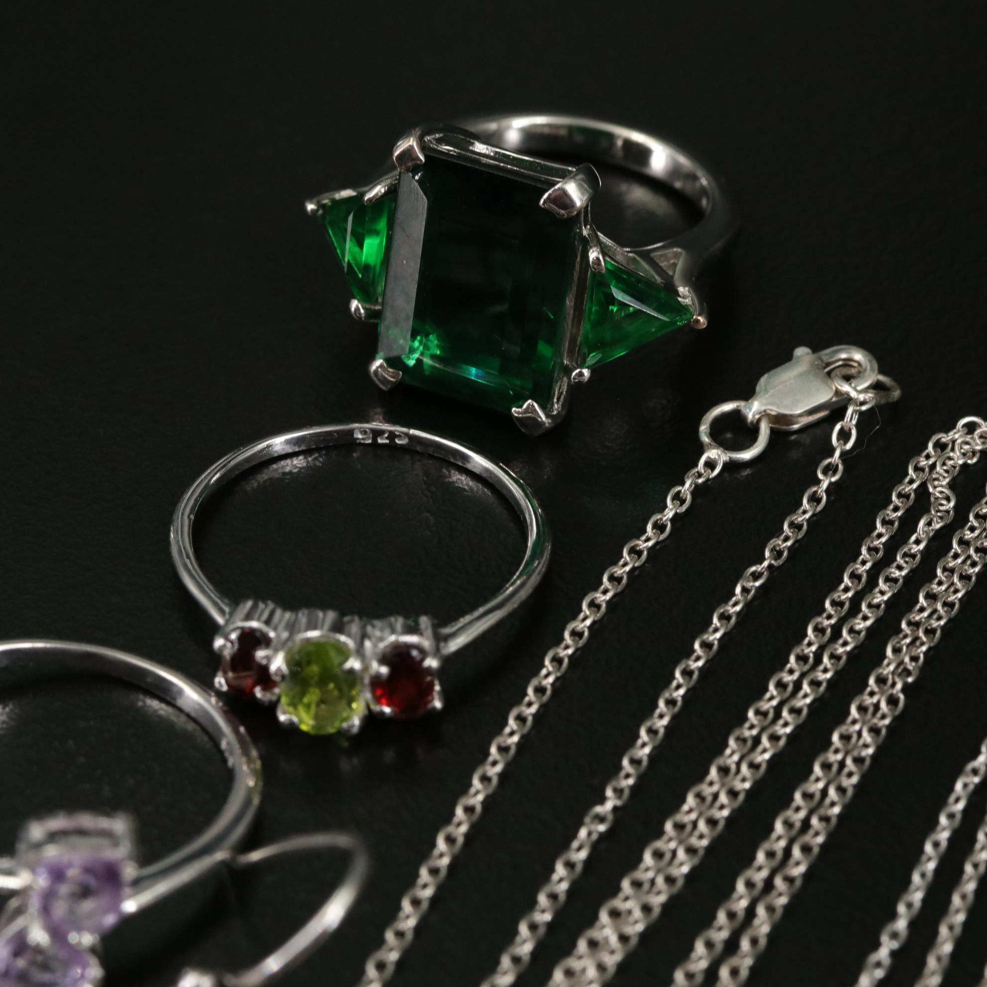 Group of 14 Assorted Sterling Silver Rings, Necklaces, Earrings, and Pendants