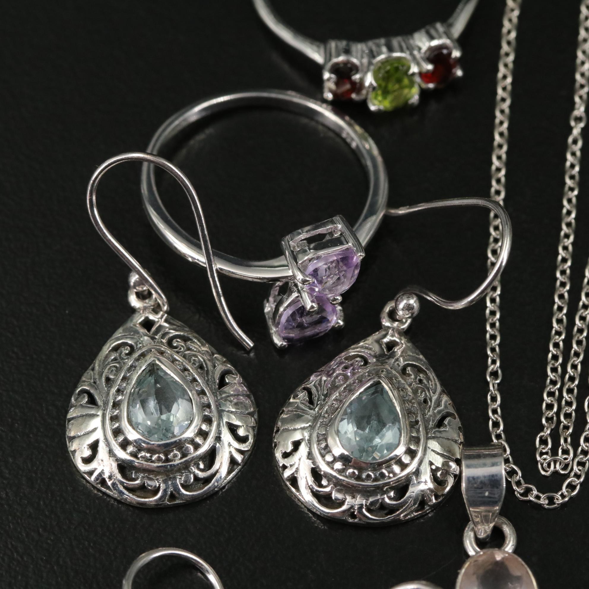 Group of 14 Assorted Sterling Silver Rings, Necklaces, Earrings, and Pendants