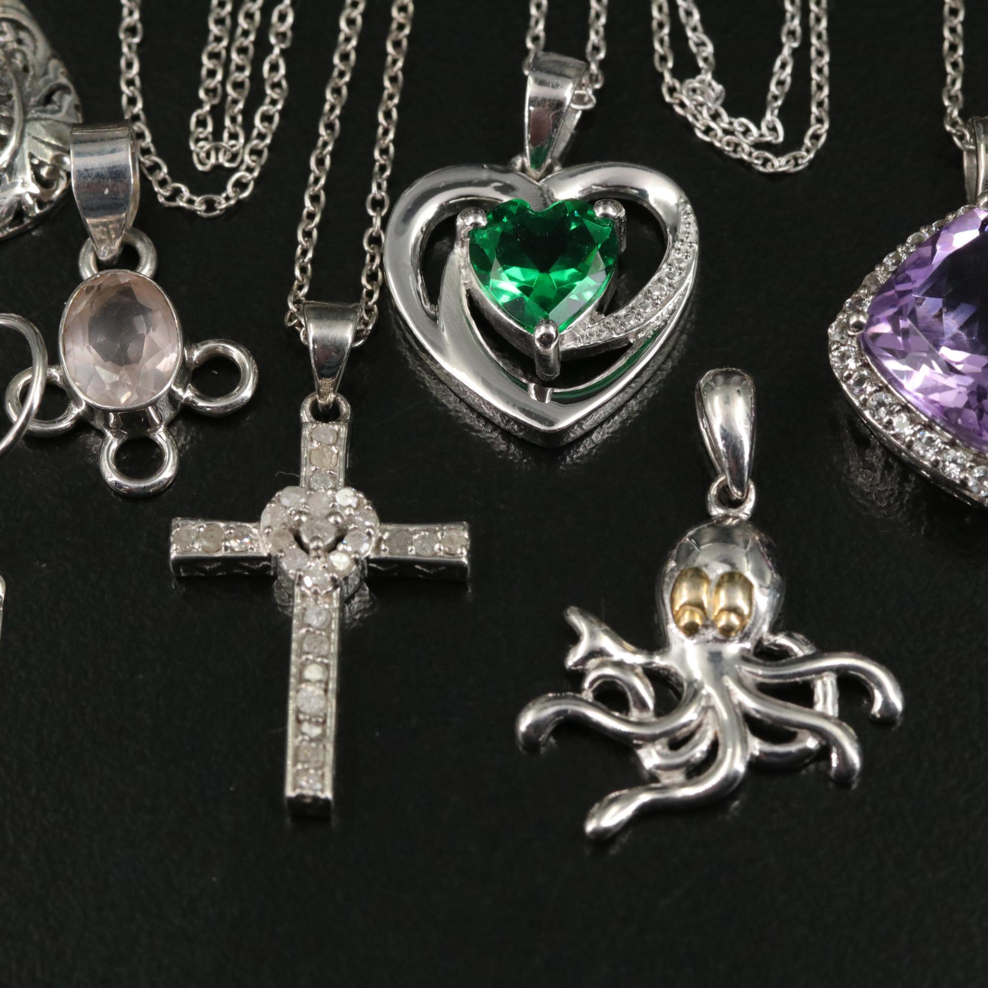 Group of 14 Assorted Sterling Silver Rings, Necklaces, Earrings, and Pendants