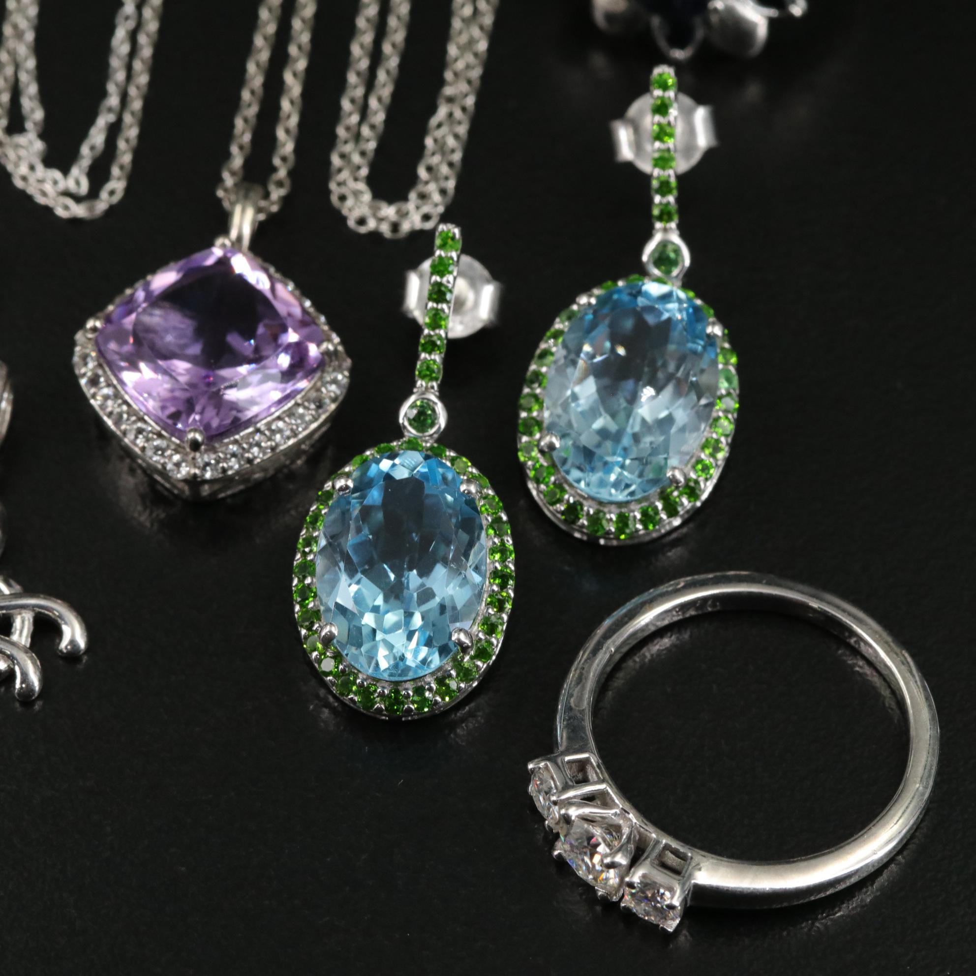 Group of 14 Assorted Sterling Silver Rings, Necklaces, Earrings, and Pendants