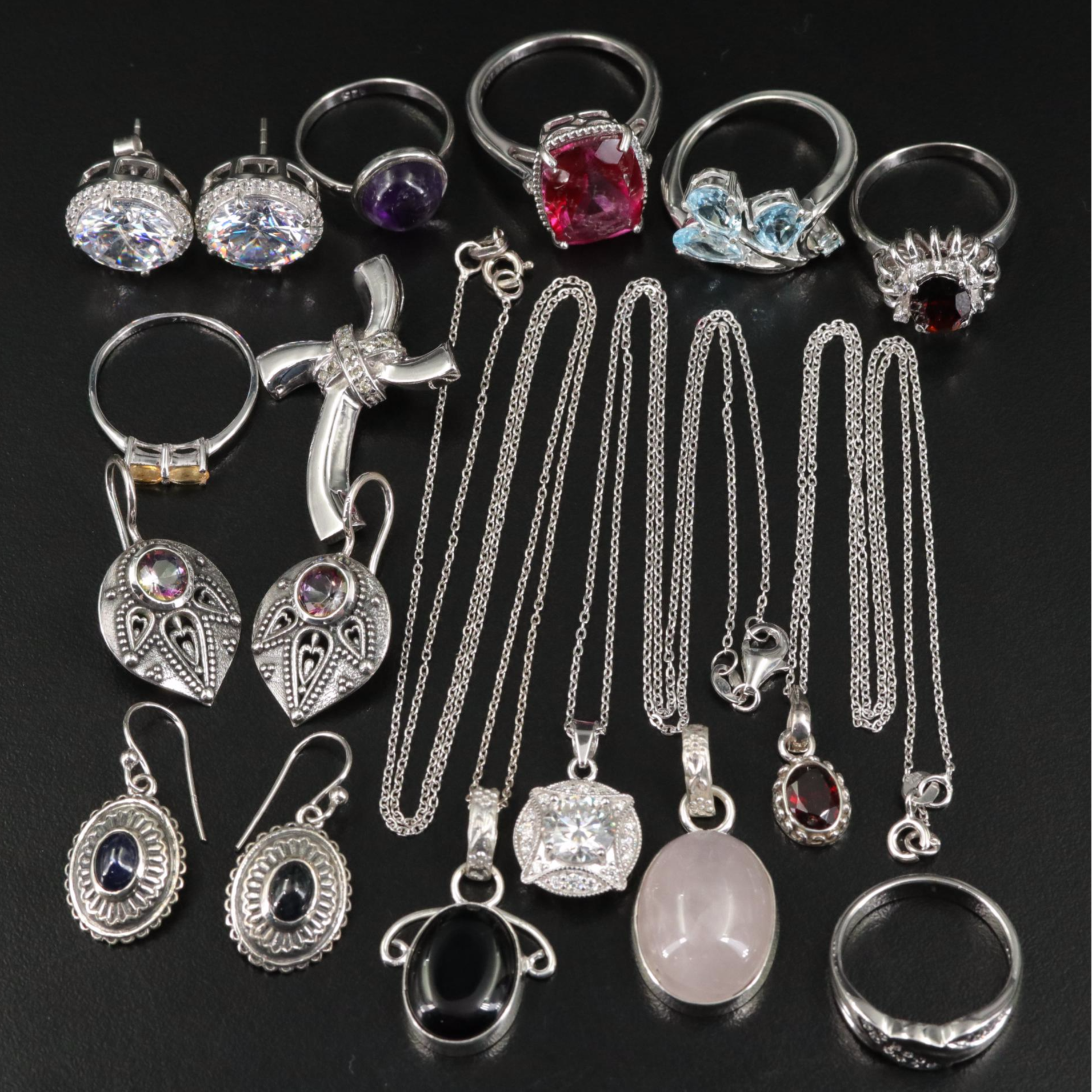 Group of 14 Assorted Sterling Silver Rings, Necklaces, Earrings, and Pendants