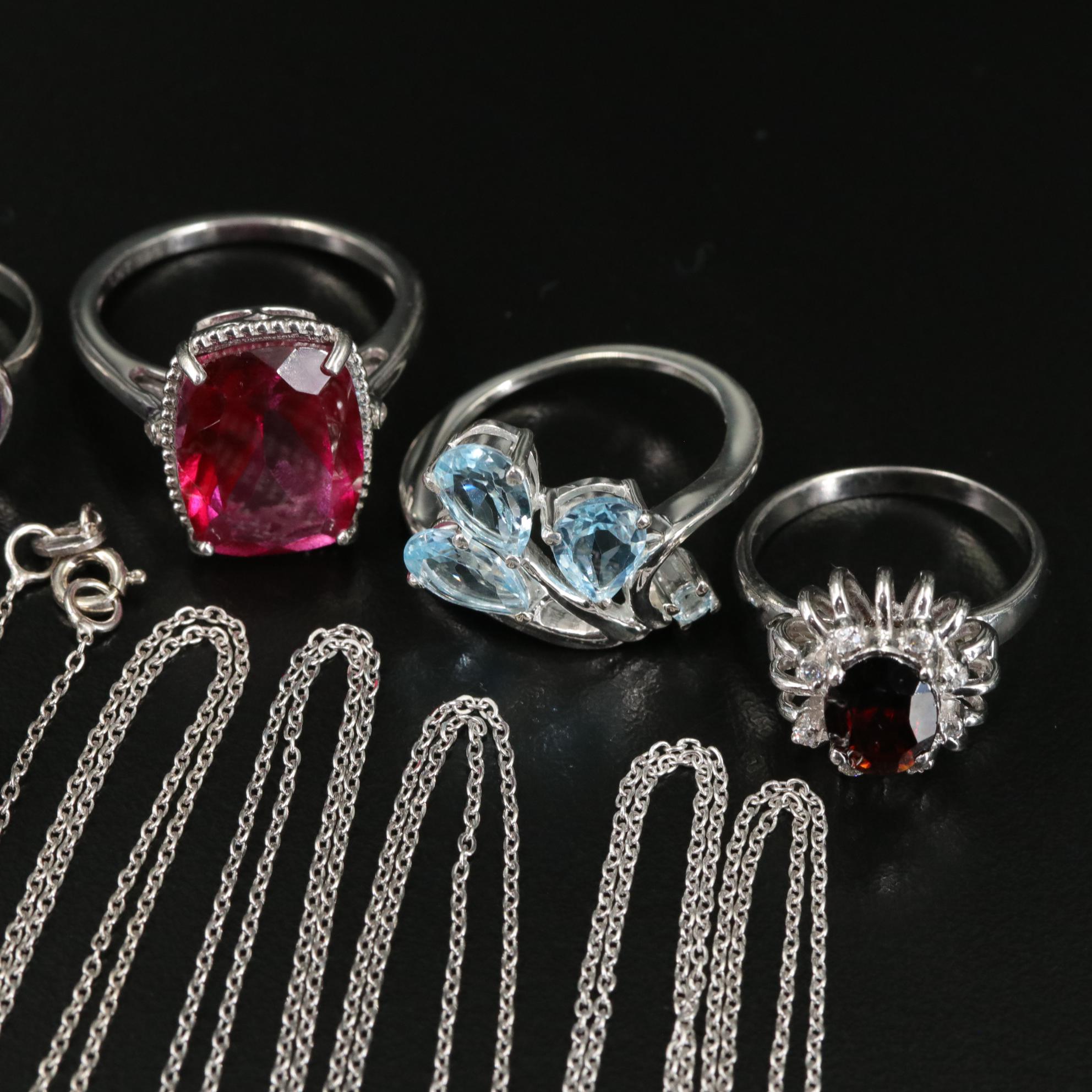 Group of 14 Assorted Sterling Silver Rings, Necklaces, Earrings, and Pendants