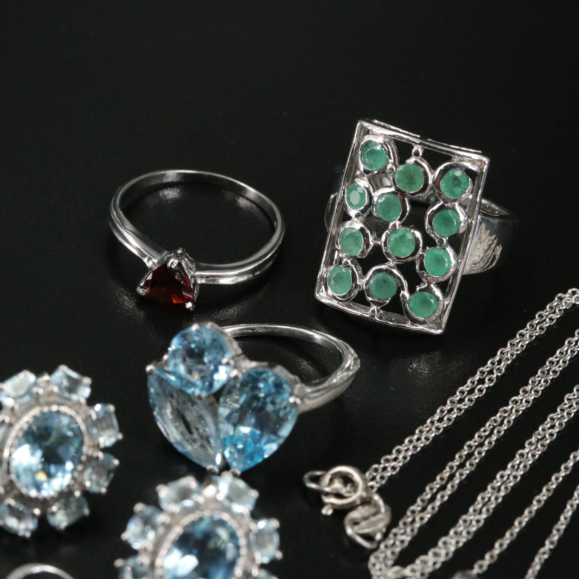 Group of 14 Assorted Sterling Silver Rings, Necklaces, Earrings, and Pendants