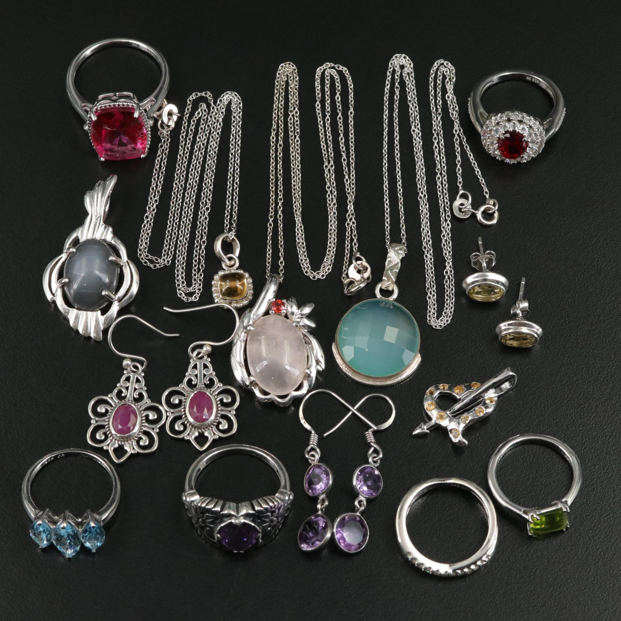 Group of 14 Assorted Sterling Silver Rings, Necklaces, Earrings, and Pendants