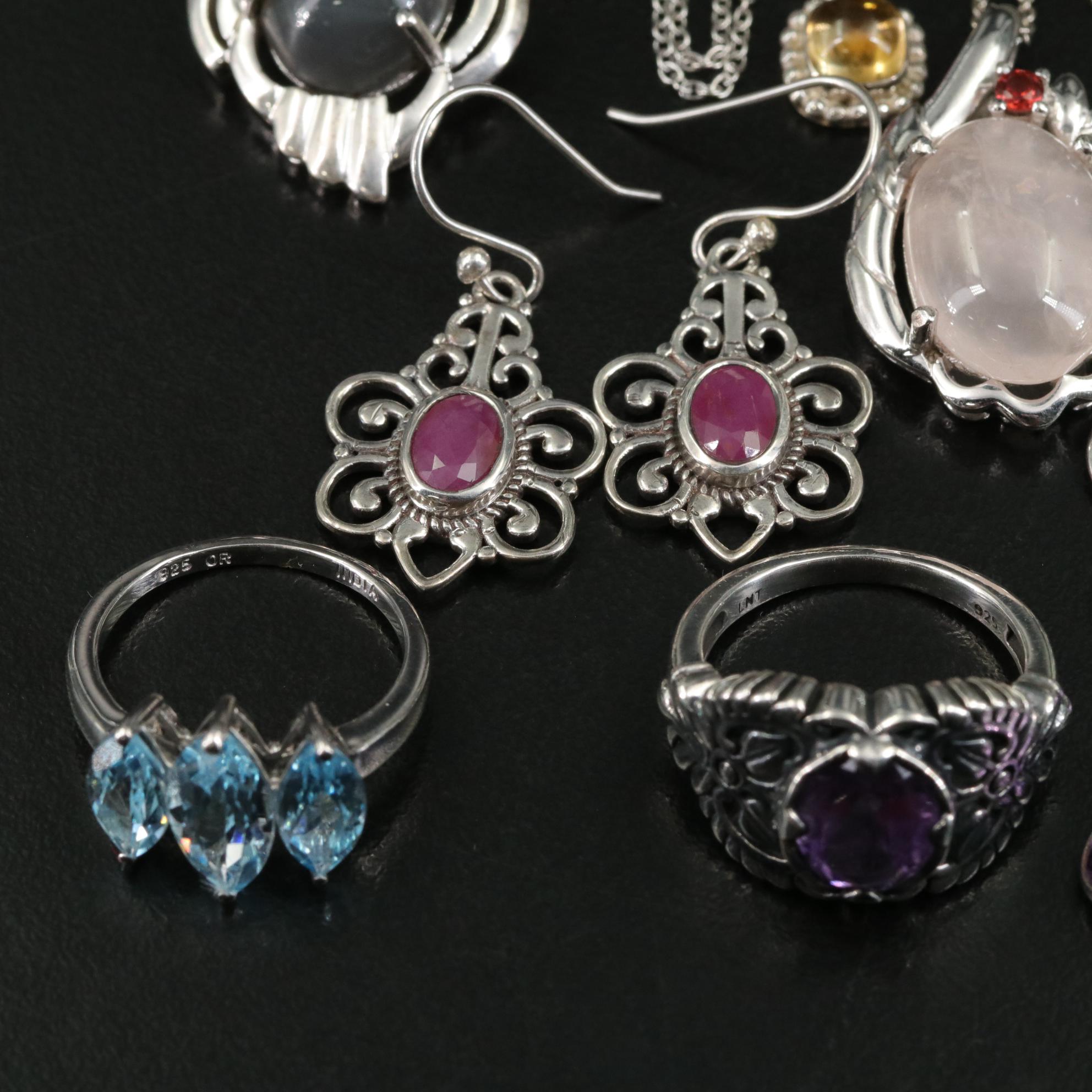 Group of 14 Assorted Sterling Silver Rings, Necklaces, Earrings, and Pendants