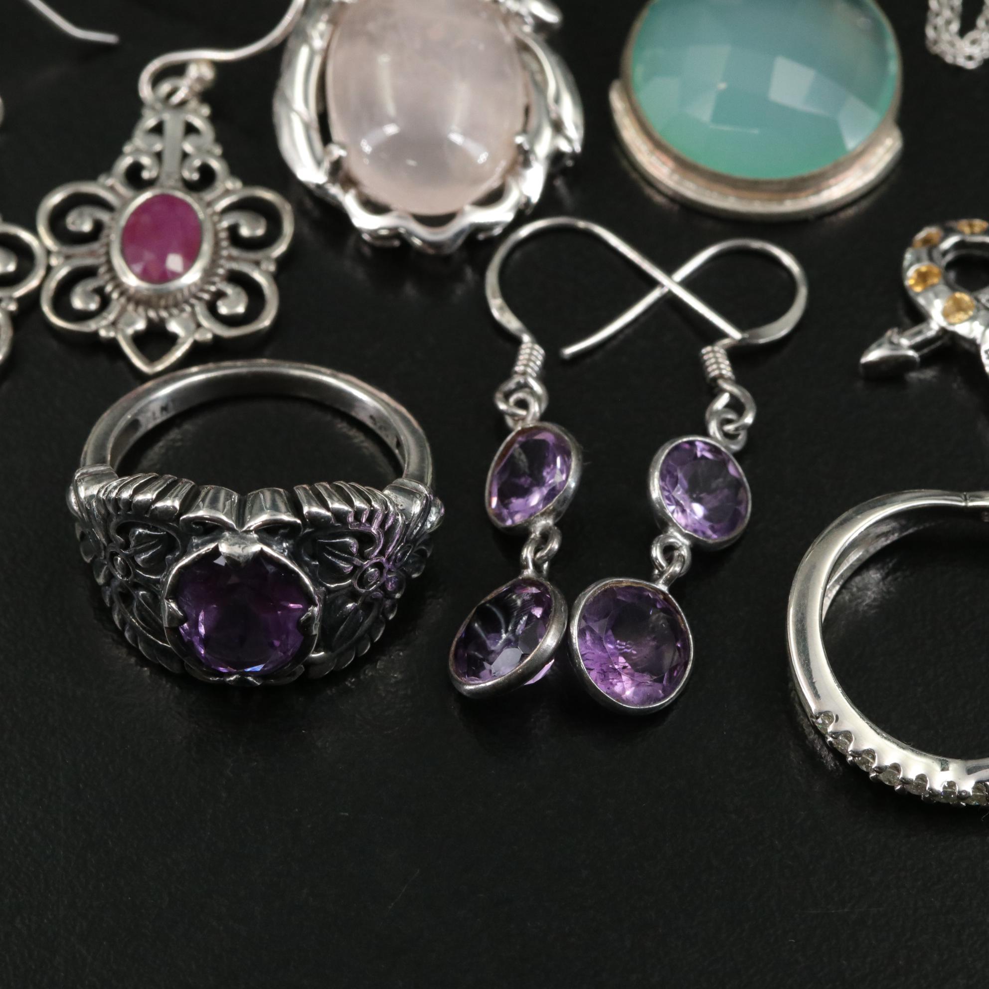 Group of 14 Assorted Sterling Silver Rings, Necklaces, Earrings, and Pendants