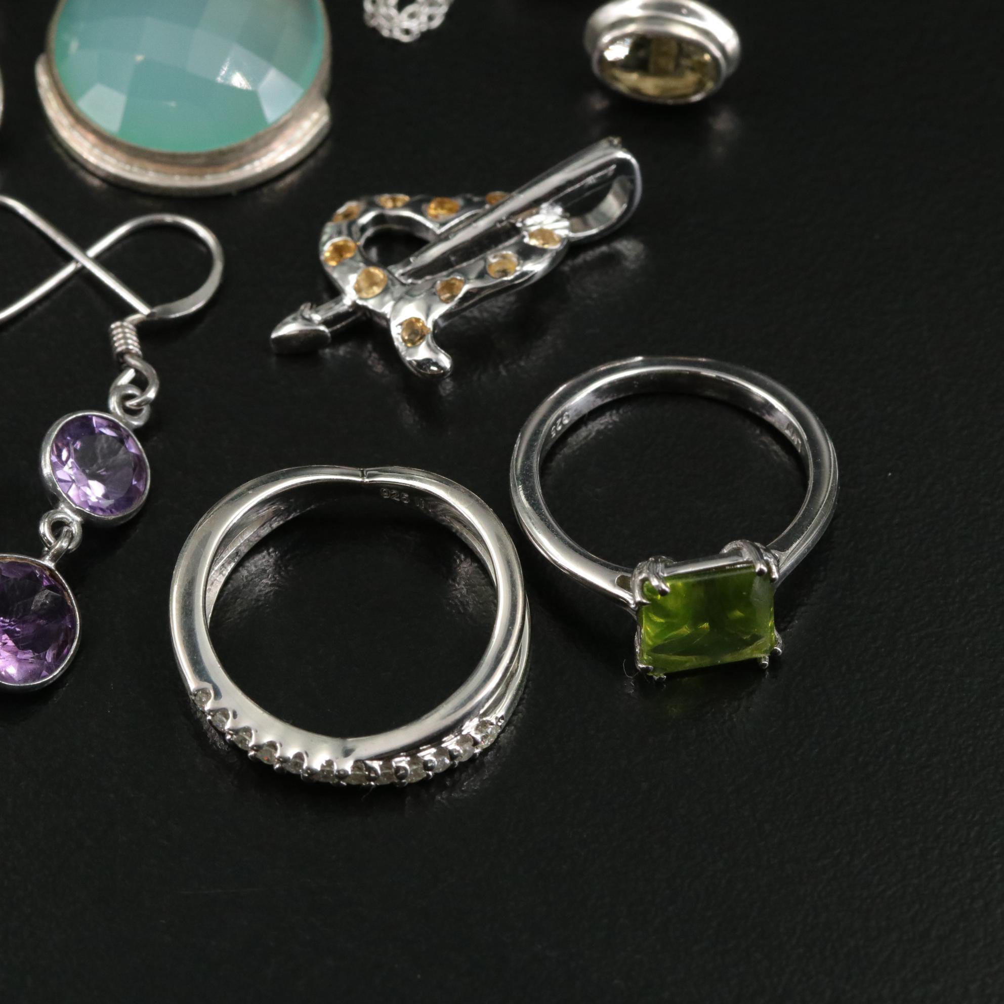 Group of 14 Assorted Sterling Silver Rings, Necklaces, Earrings, and Pendants