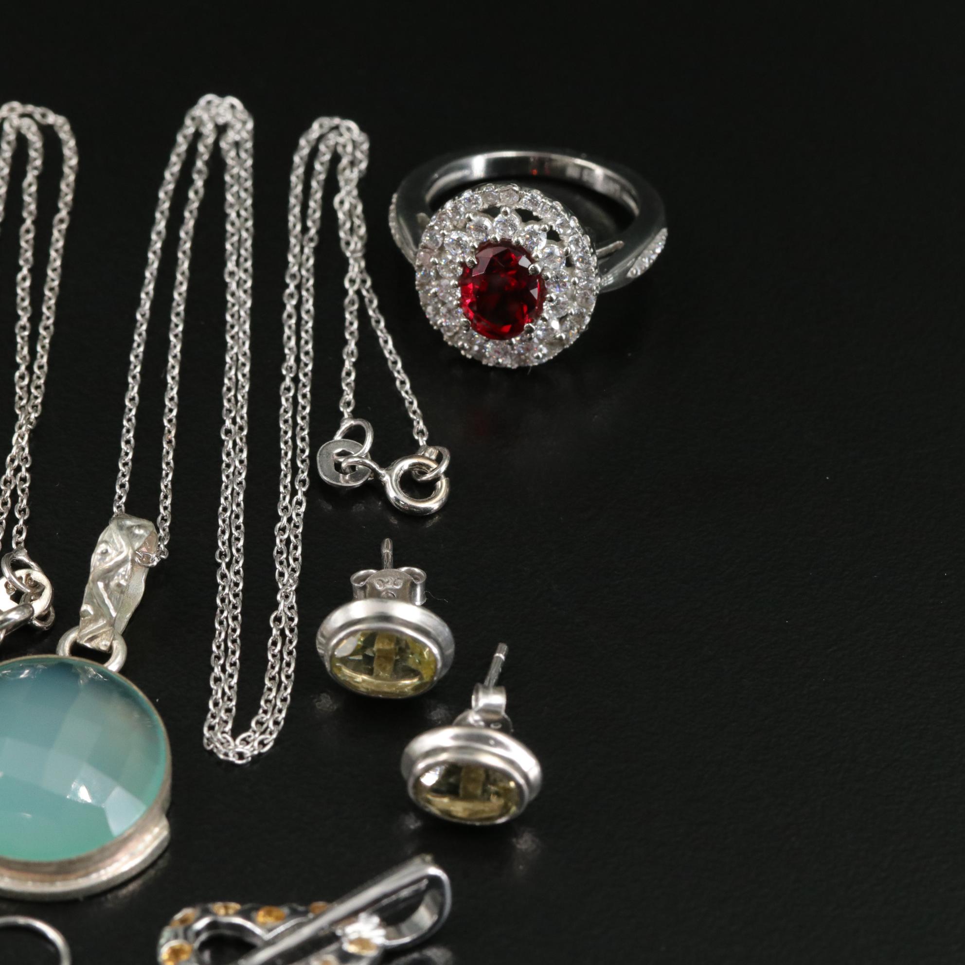 Group of 14 Assorted Sterling Silver Rings, Necklaces, Earrings, and Pendants