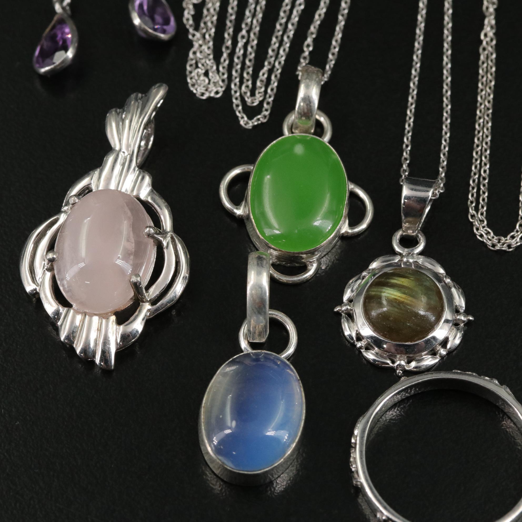 Group of 14 Assorted Sterling Silver Rings, Necklaces, Earrings, and Pendants