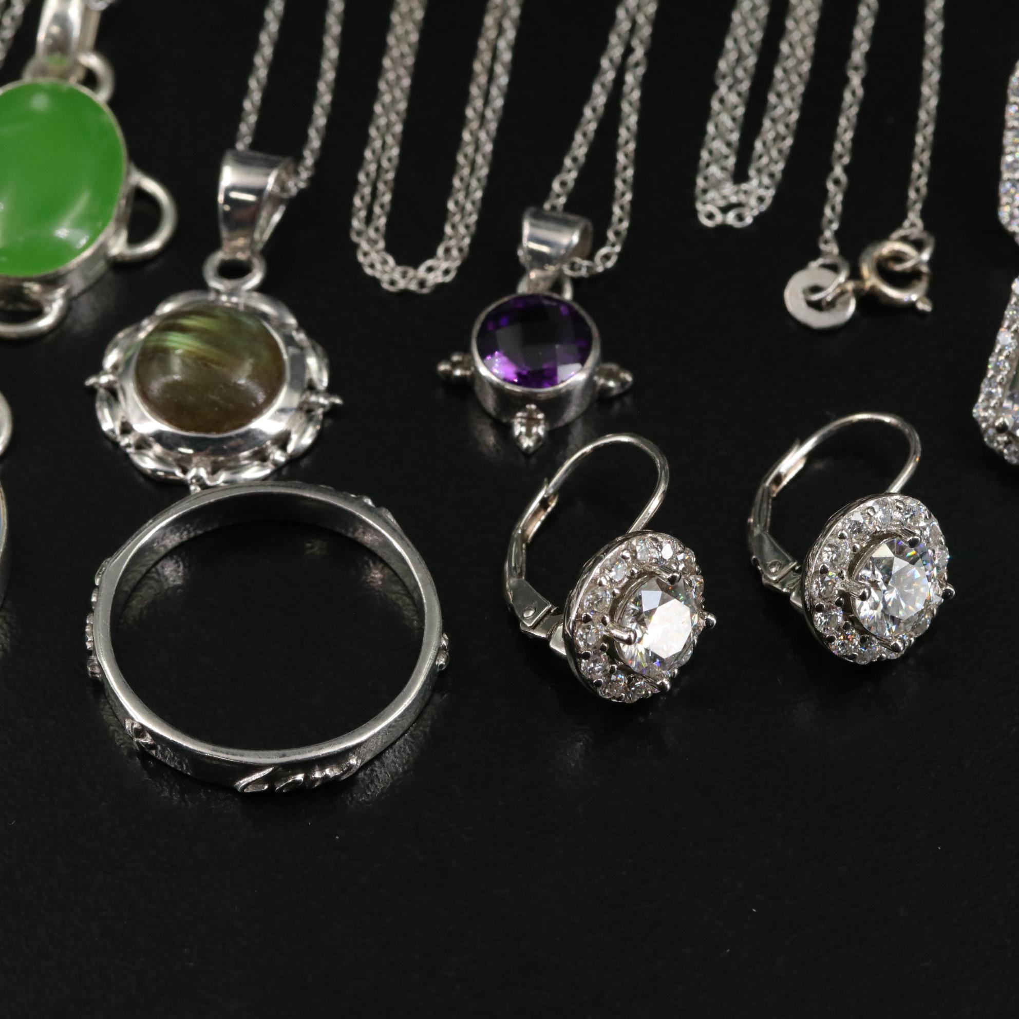 Group of 14 Assorted Sterling Silver Rings, Necklaces, Earrings, and Pendants
