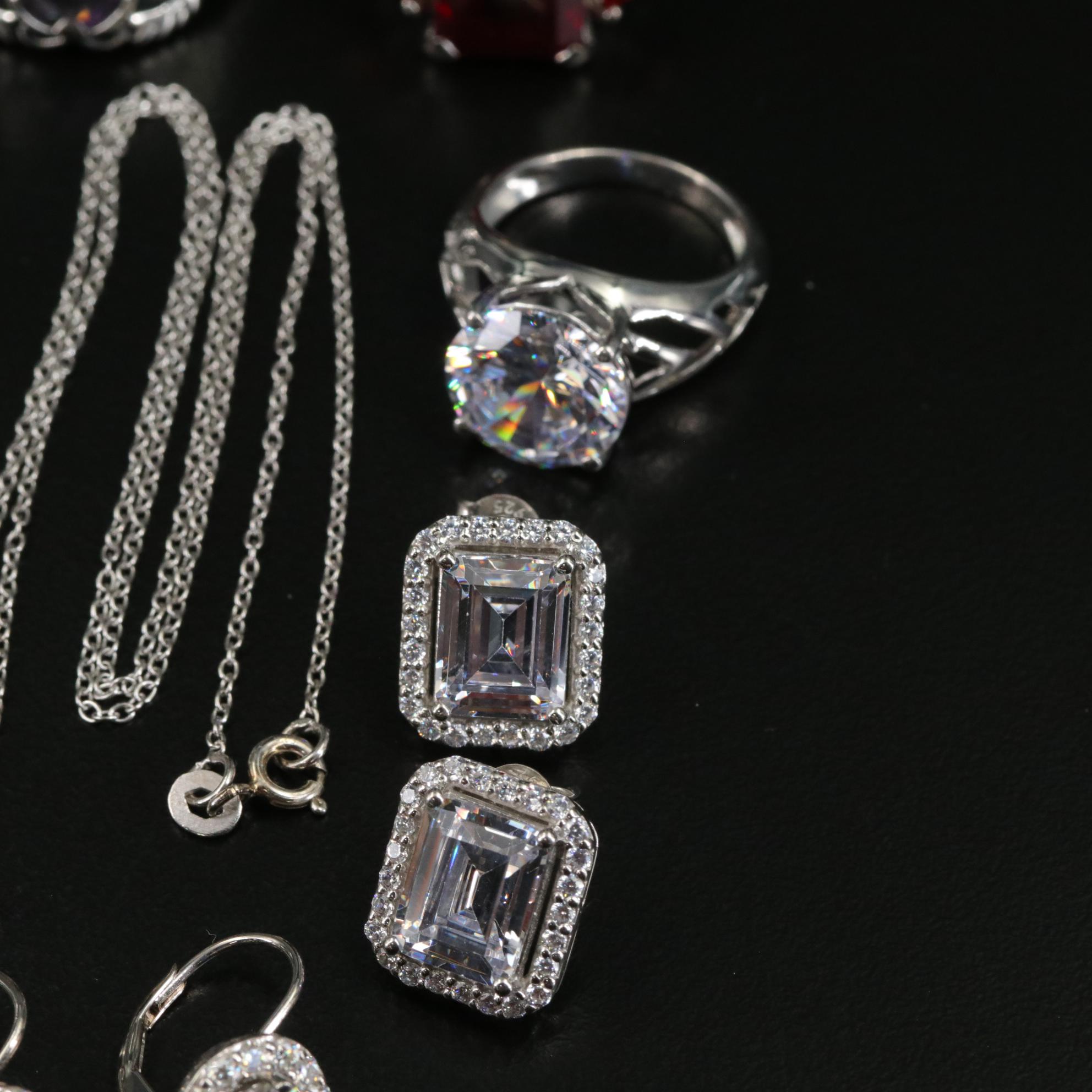 Group of 14 Assorted Sterling Silver Rings, Necklaces, Earrings, and Pendants