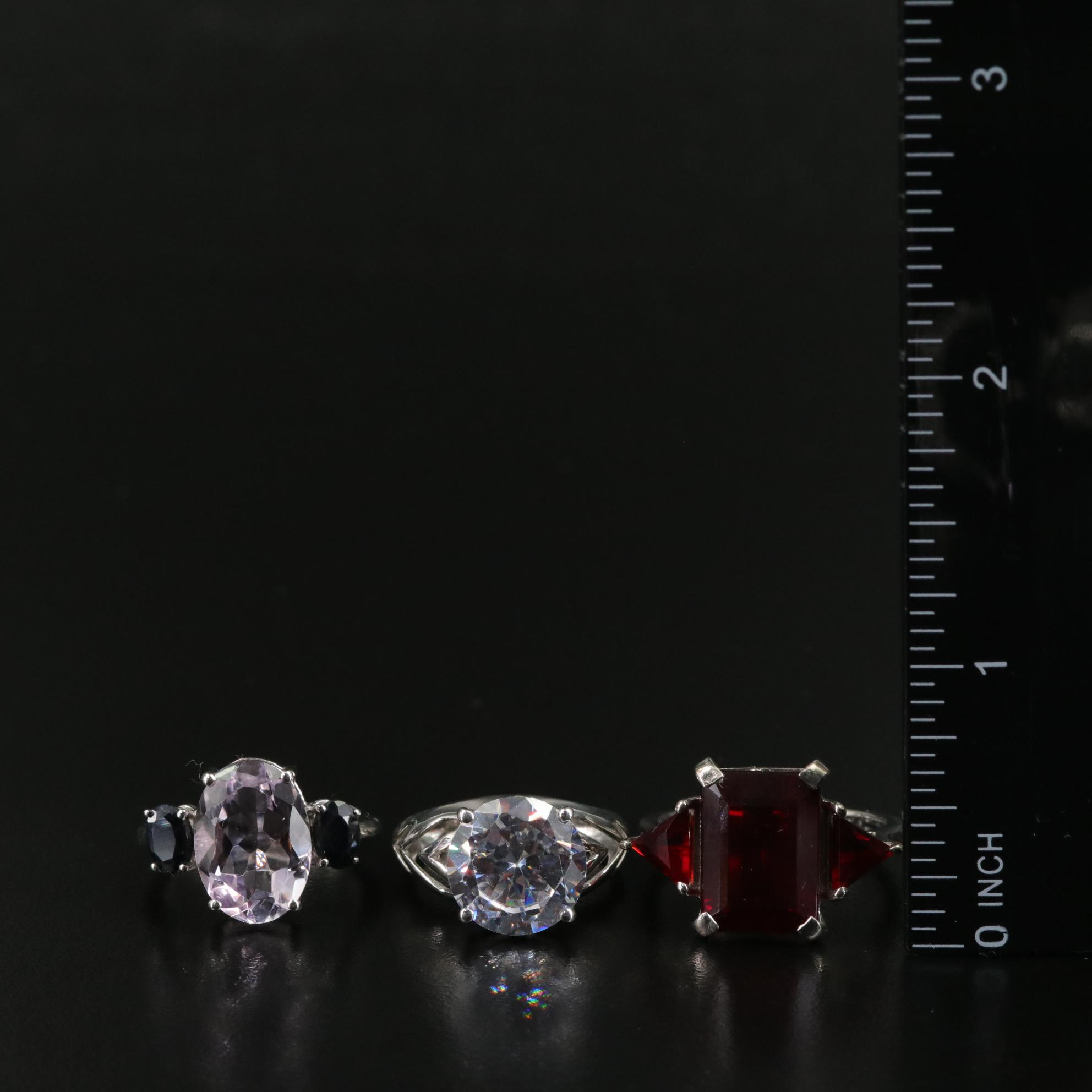 Group of 14 Assorted Sterling Silver Rings, Necklaces, Earrings, and Pendants