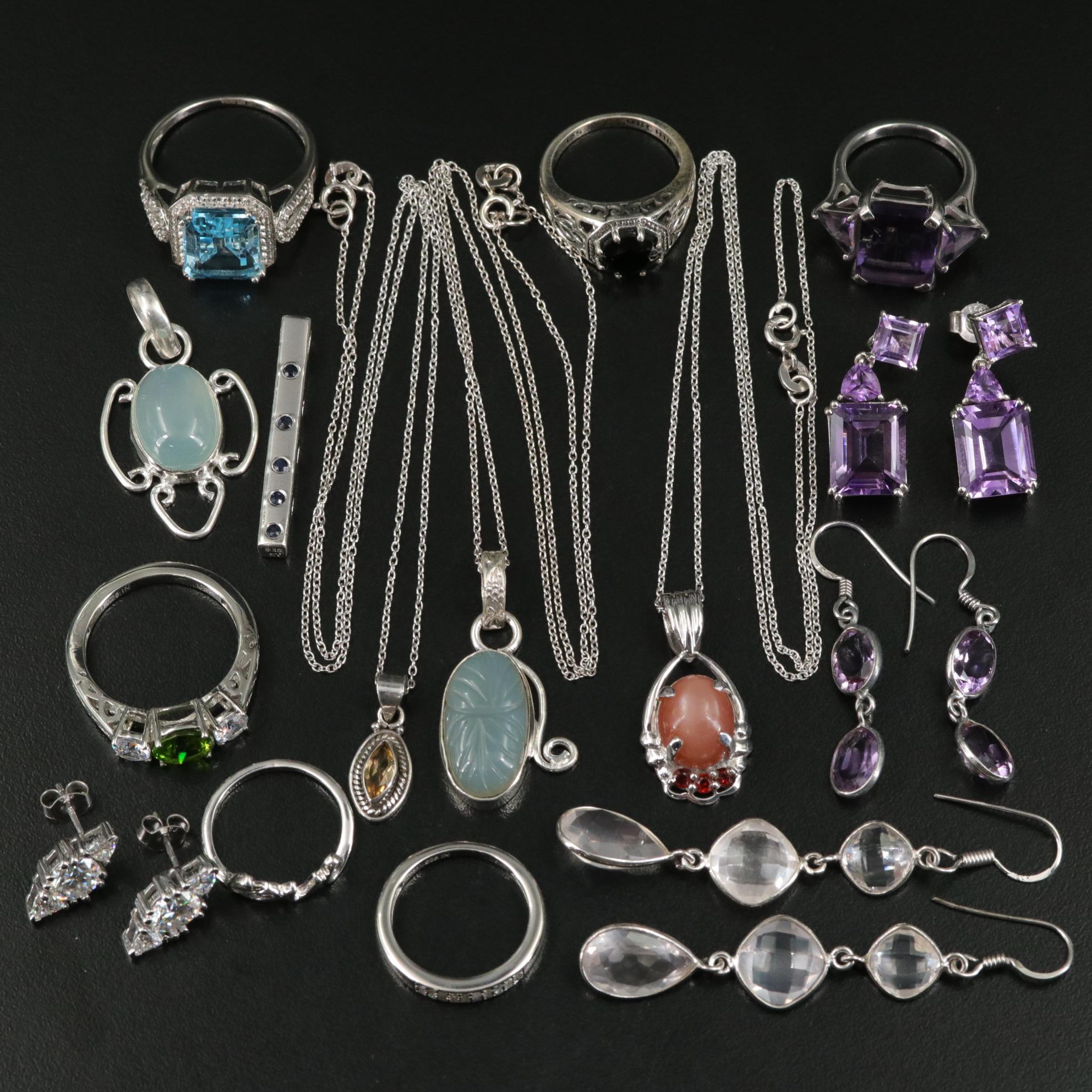 Group of 14 Assorted Sterling Silver Rings, Necklaces, Earrings, and Pendants