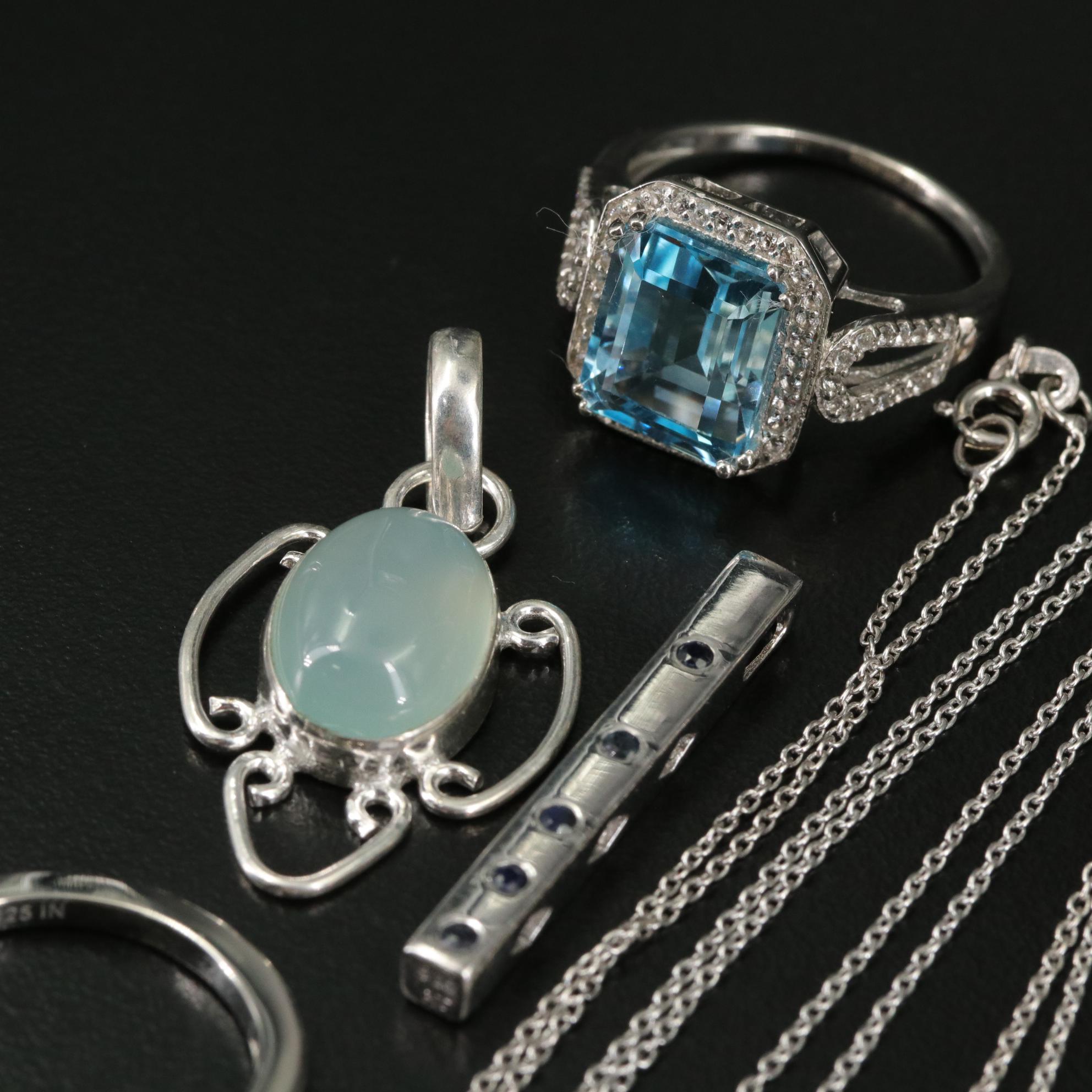 Group of 14 Assorted Sterling Silver Rings, Necklaces, Earrings, and Pendants