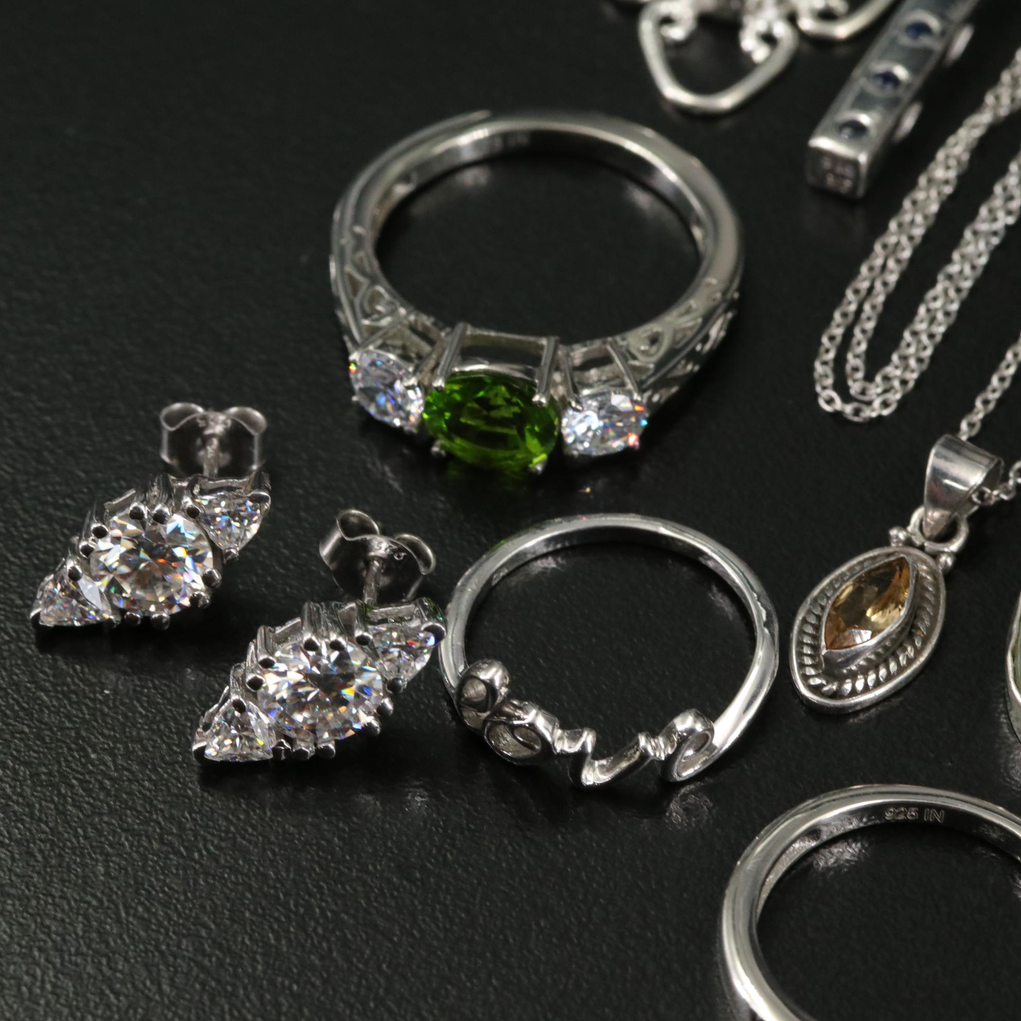 Group of 14 Assorted Sterling Silver Rings, Necklaces, Earrings, and Pendants