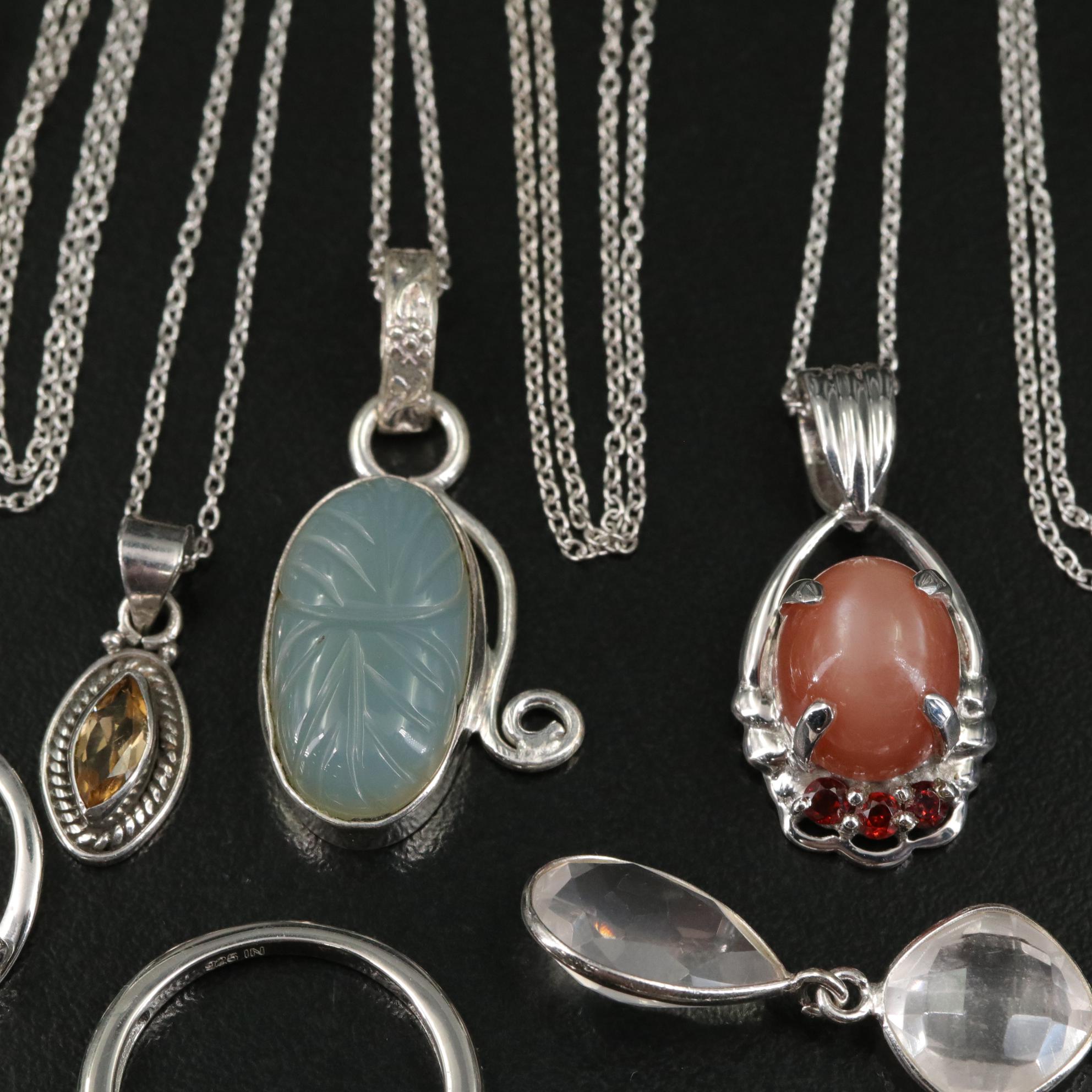 Group of 14 Assorted Sterling Silver Rings, Necklaces, Earrings, and Pendants