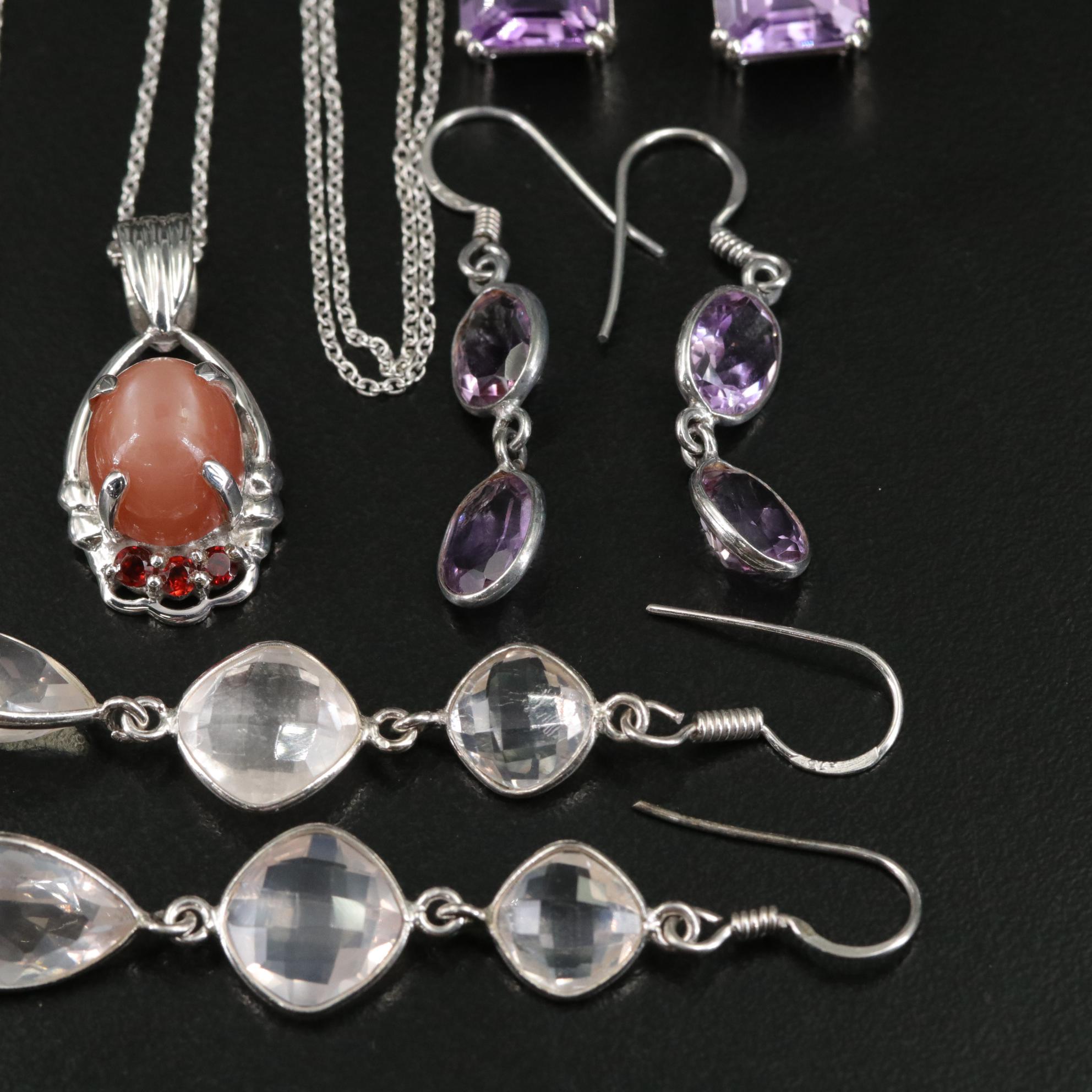 Group of 14 Assorted Sterling Silver Rings, Necklaces, Earrings, and Pendants