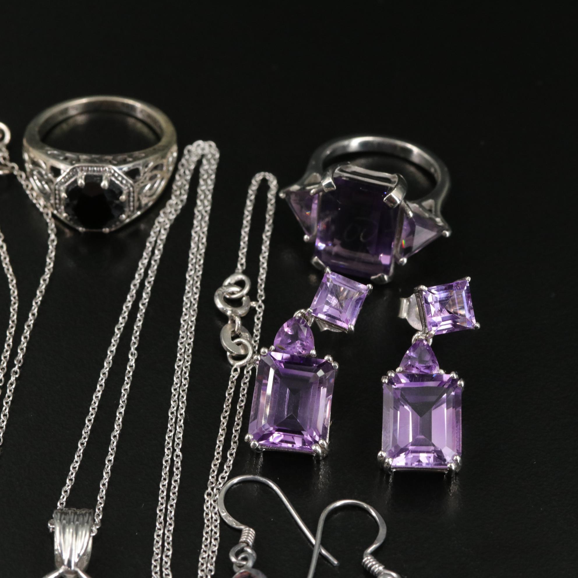 Group of 14 Assorted Sterling Silver Rings, Necklaces, Earrings, and Pendants