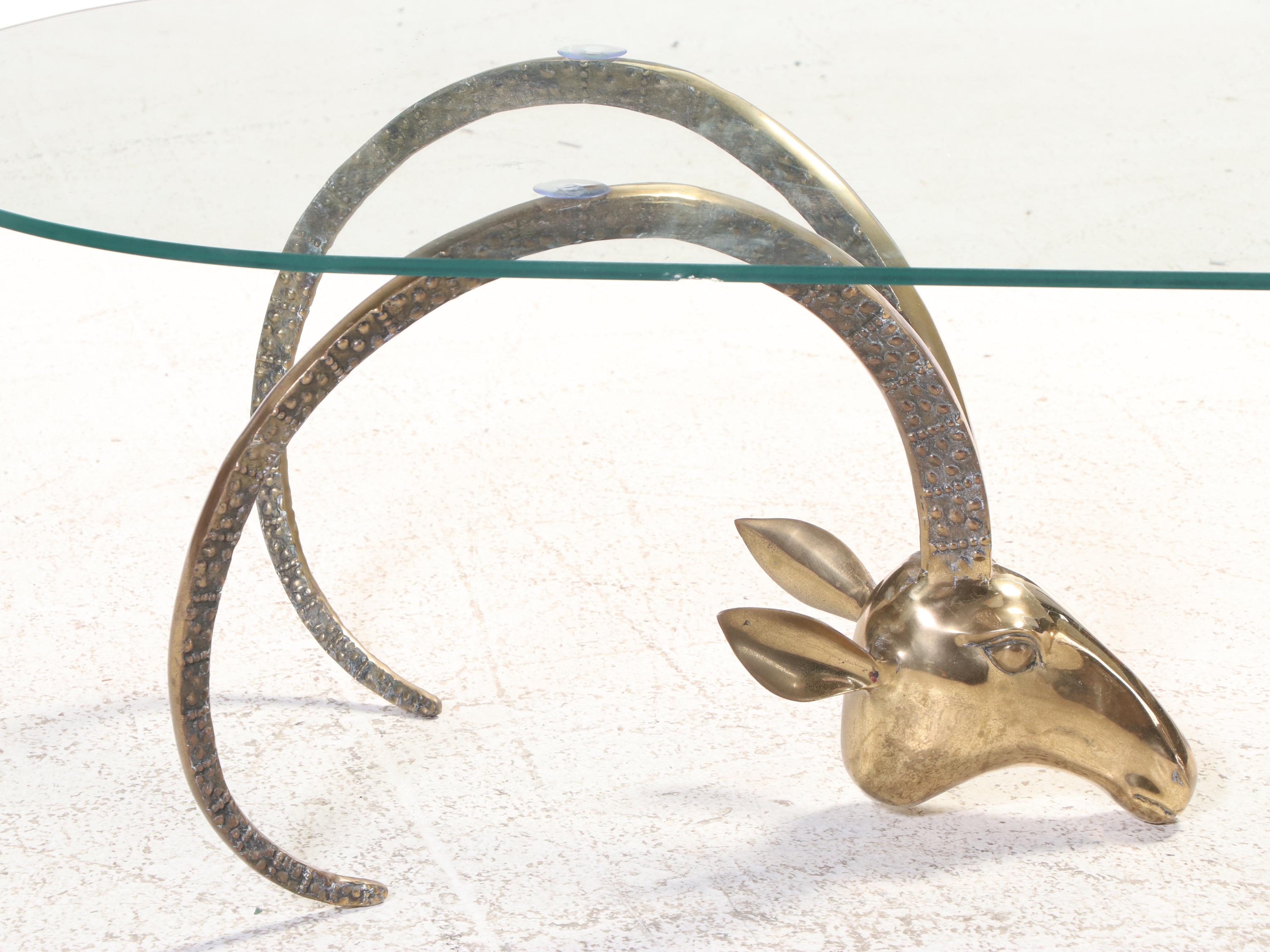 Hollywood Regency Style Brass and Glass Top Ibex Coffee Table