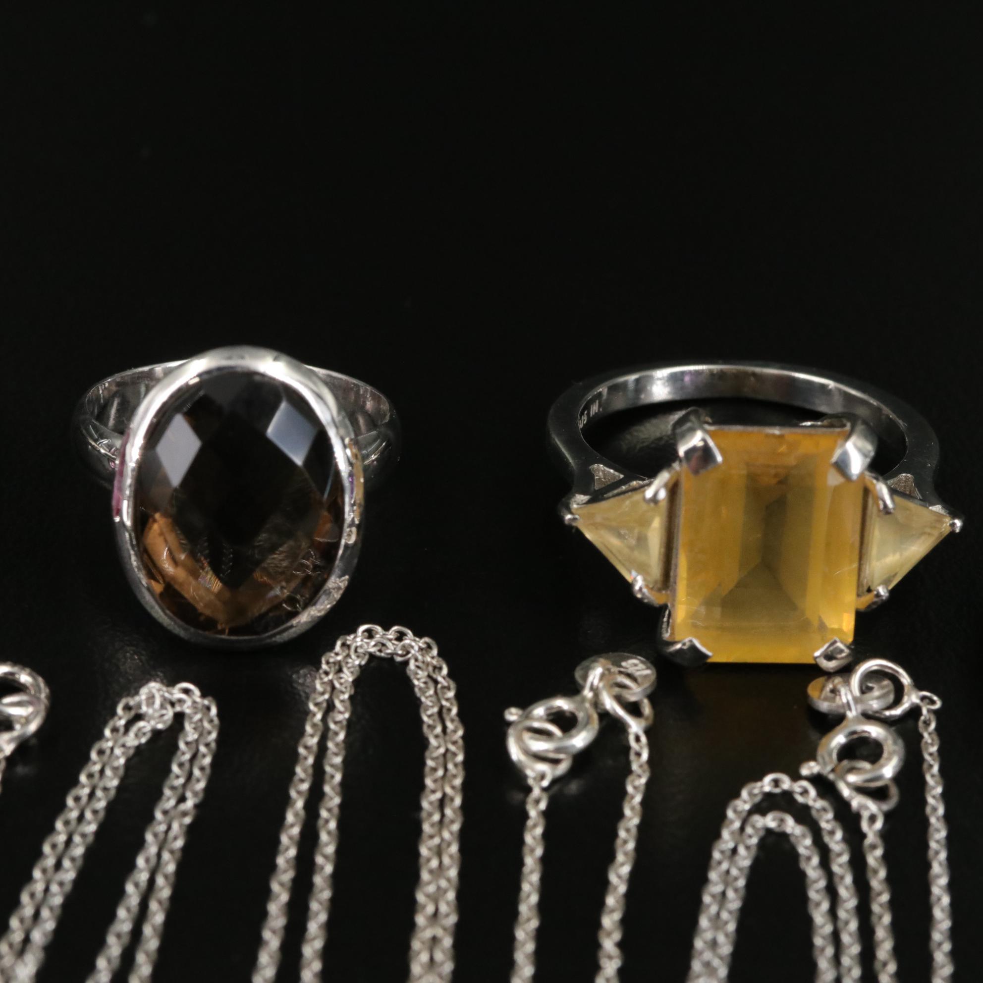 Group of 14 Assorted Sterling Silver Rings, Necklaces, Earrings, and Pendants