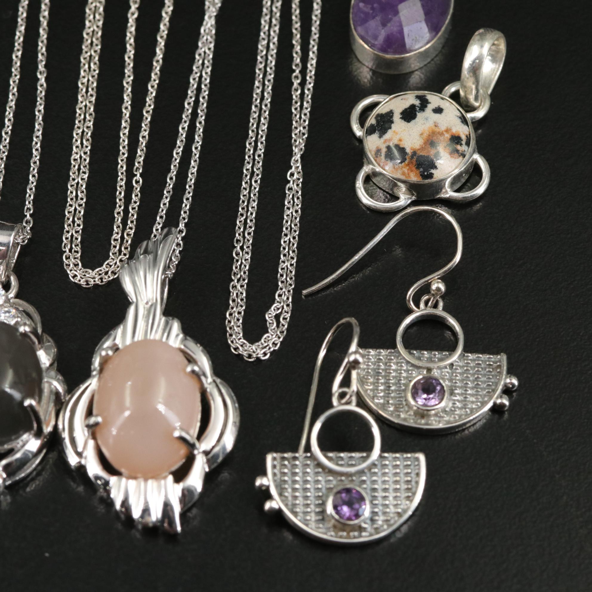 Group of 14 Assorted Sterling Silver Rings, Necklaces, Earrings, and Pendants