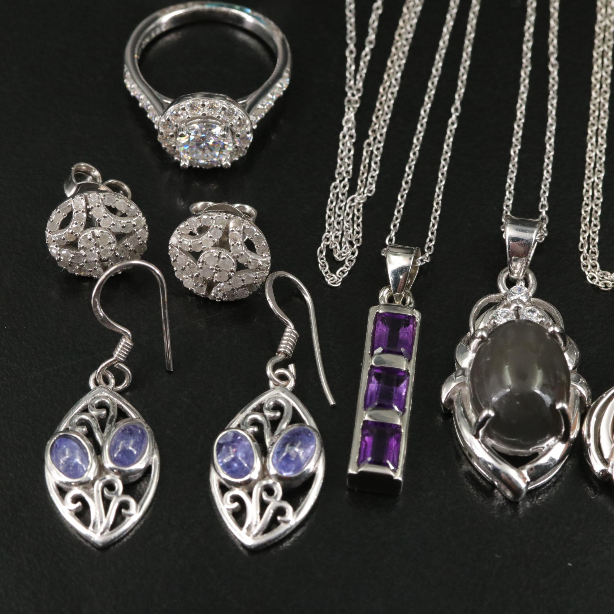 Group of 14 Assorted Sterling Silver Rings, Necklaces, Earrings, and Pendants