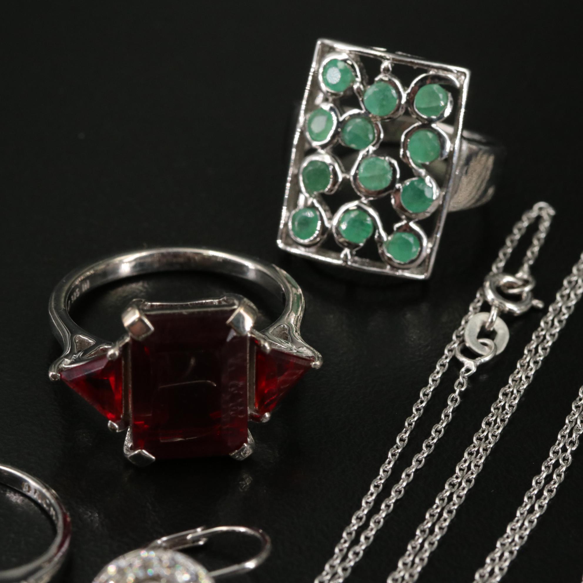 Group of 14 Assorted Sterling Silver Rings, Necklaces, Earrings, and Pendants