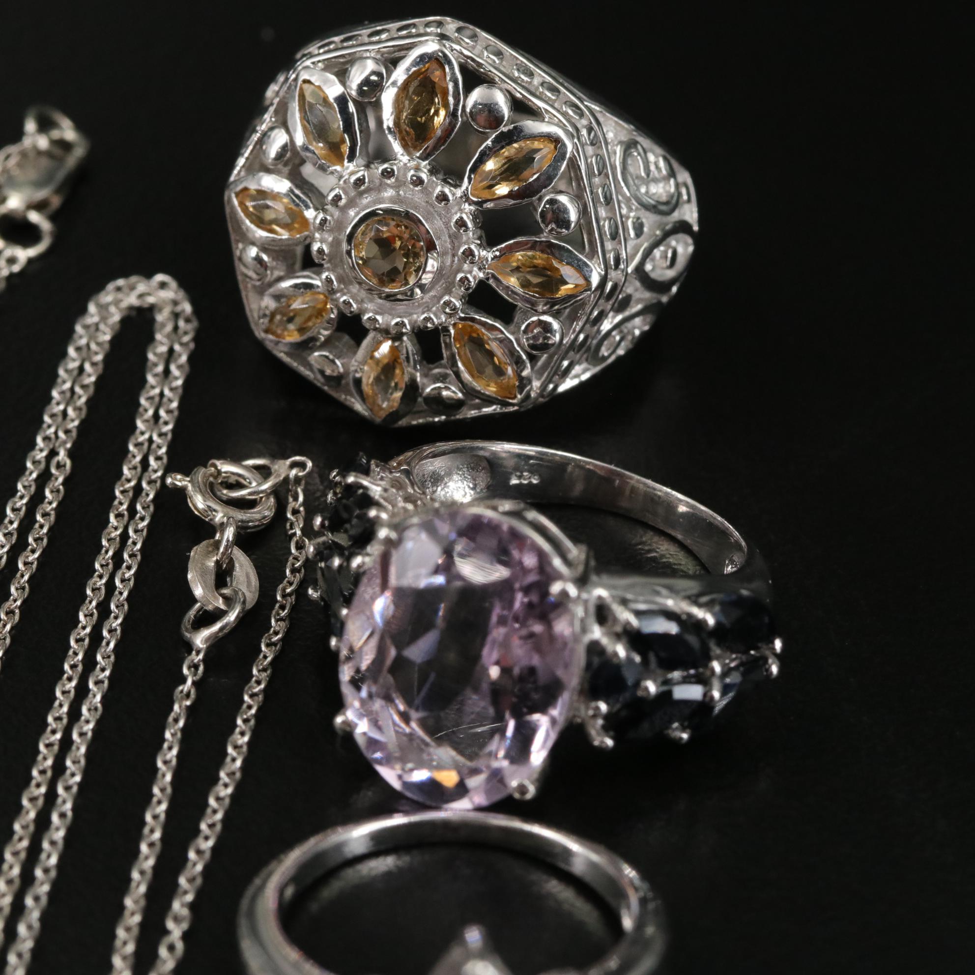 Group of 14 Assorted Sterling Silver Rings, Necklaces, Earrings, and Pendants