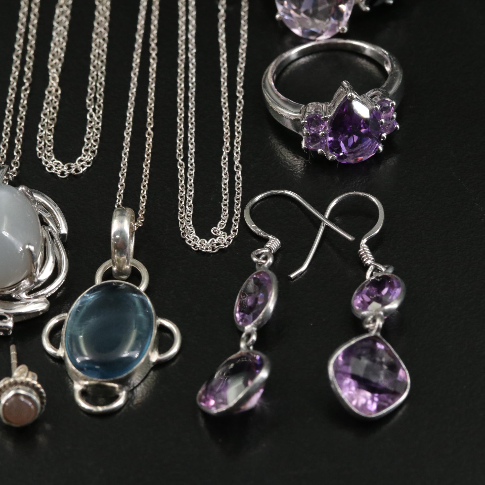 Group of 14 Assorted Sterling Silver Rings, Necklaces, Earrings, and Pendants