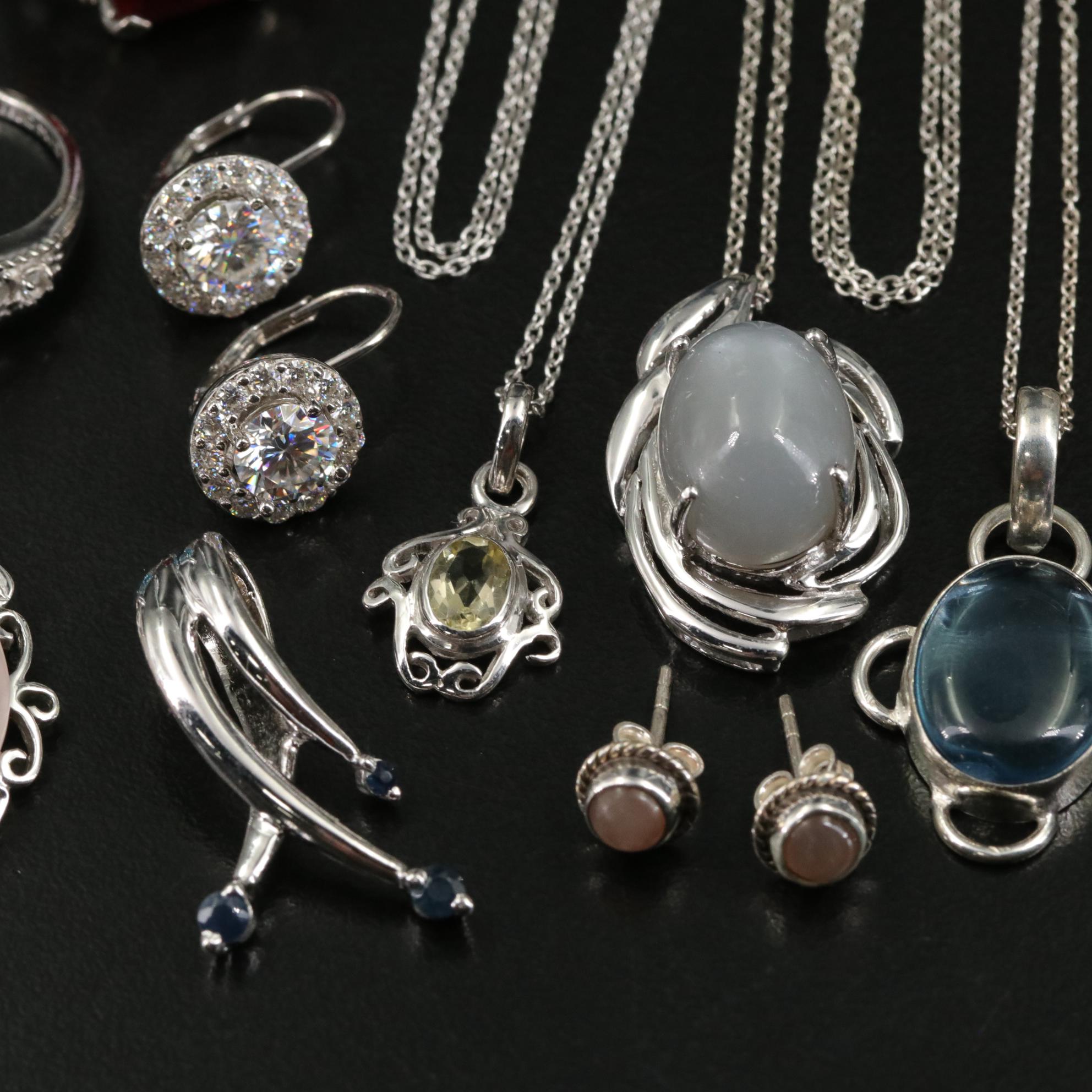 Group of 14 Assorted Sterling Silver Rings, Necklaces, Earrings, and Pendants