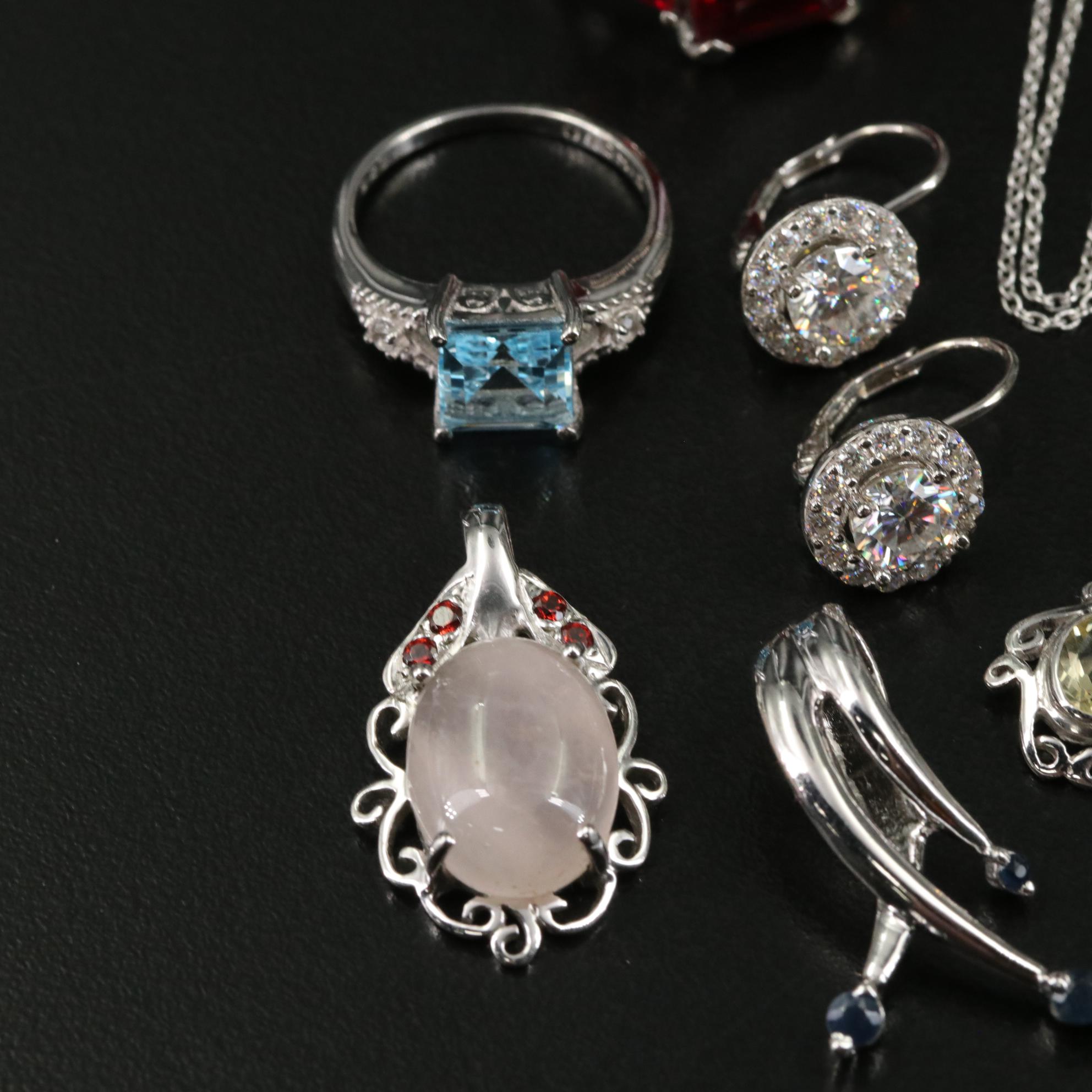 Group of 14 Assorted Sterling Silver Rings, Necklaces, Earrings, and Pendants