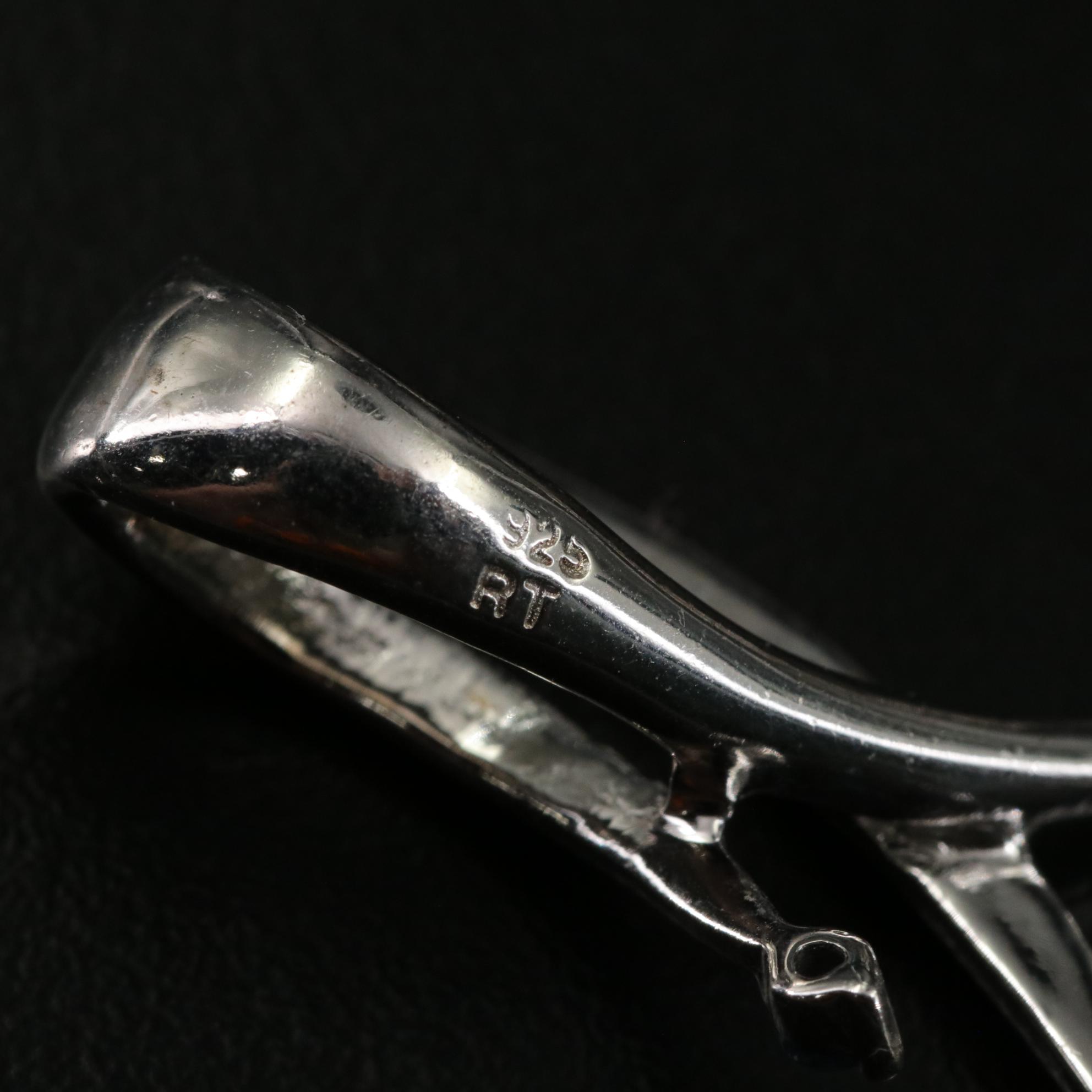 Group of 14 Assorted Sterling Silver Rings, Necklaces, Earrings, and Pendants