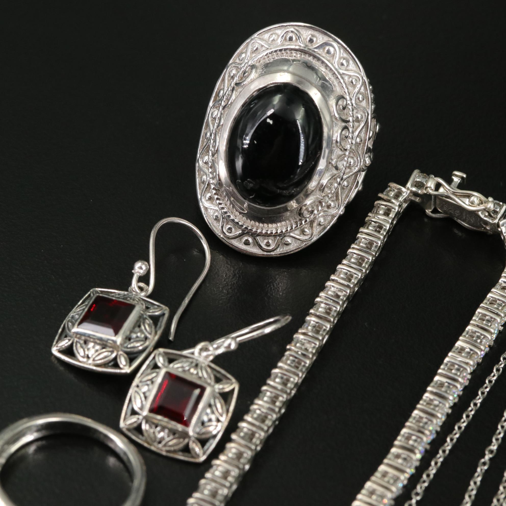 17 Assorted Sterling Silver Bracelets, Earrings, Necklaces, Pendants, and Rings