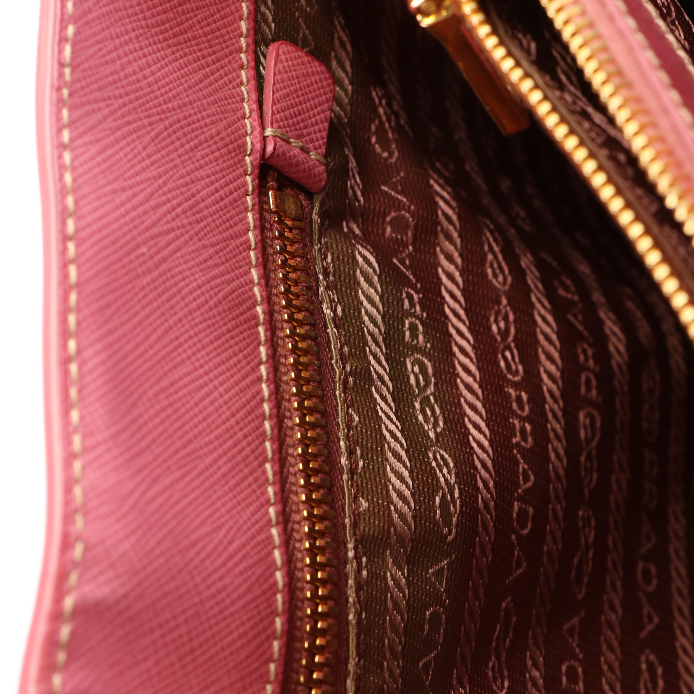 Prada Top Handle Bag in Pink Perforated Saffiano Leather