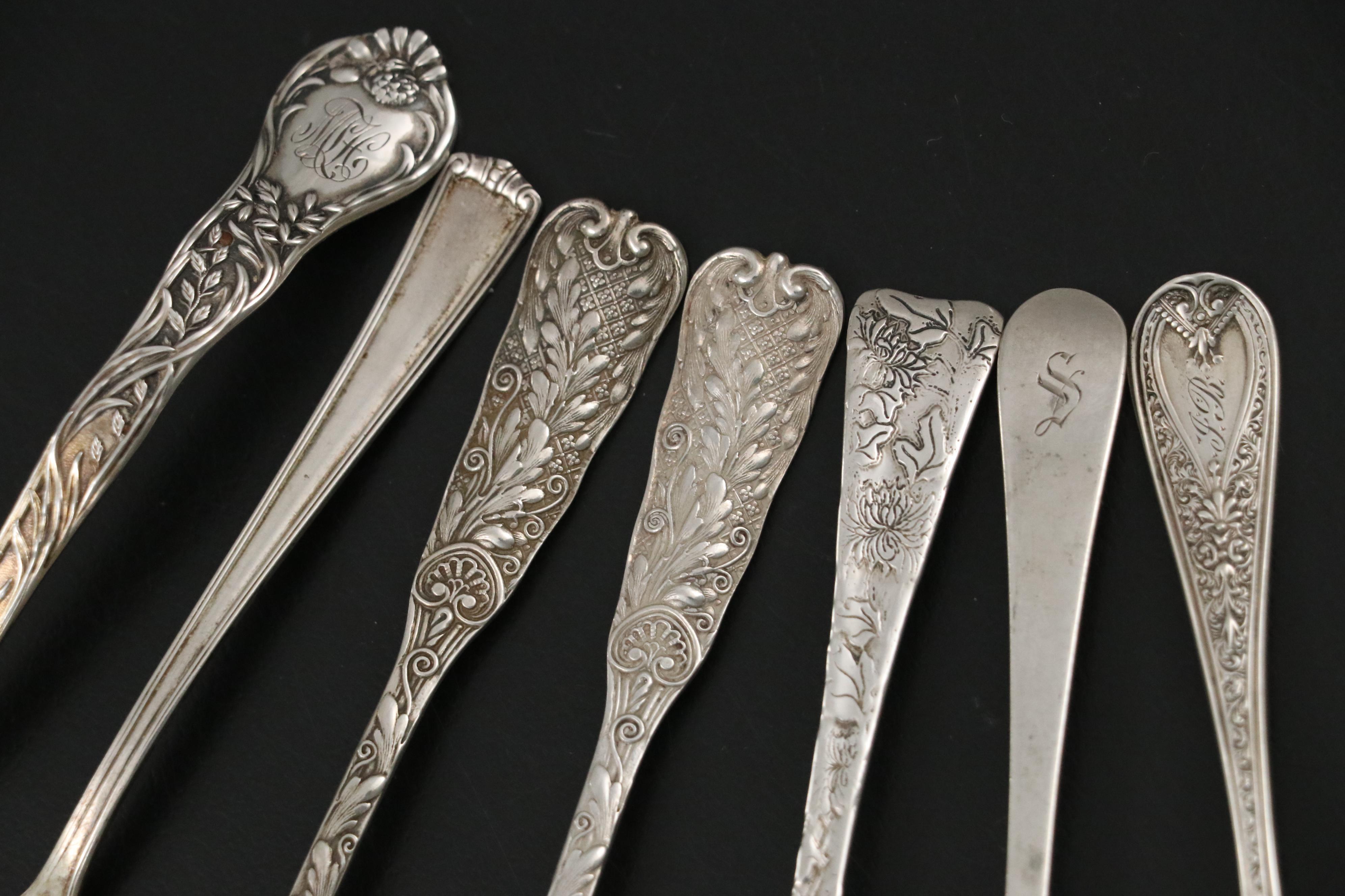Tiffany & Co. "Lap-Over-Edge" Sterling Salt Spoon with More Sterling Salt Spoons