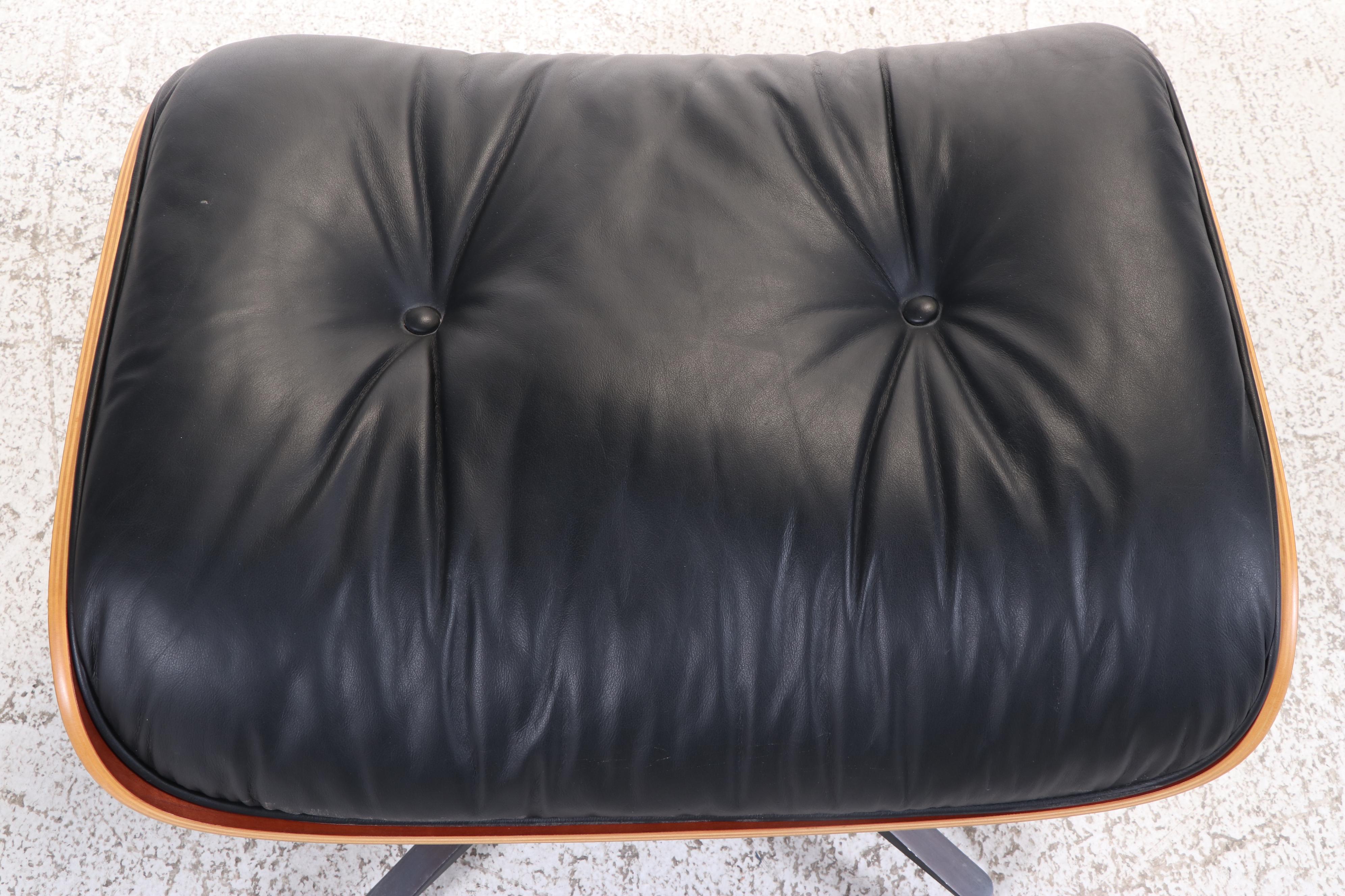 Eames for Herman Miller Laminated Cherrywood and Leather Lounge Chair & Ottoman