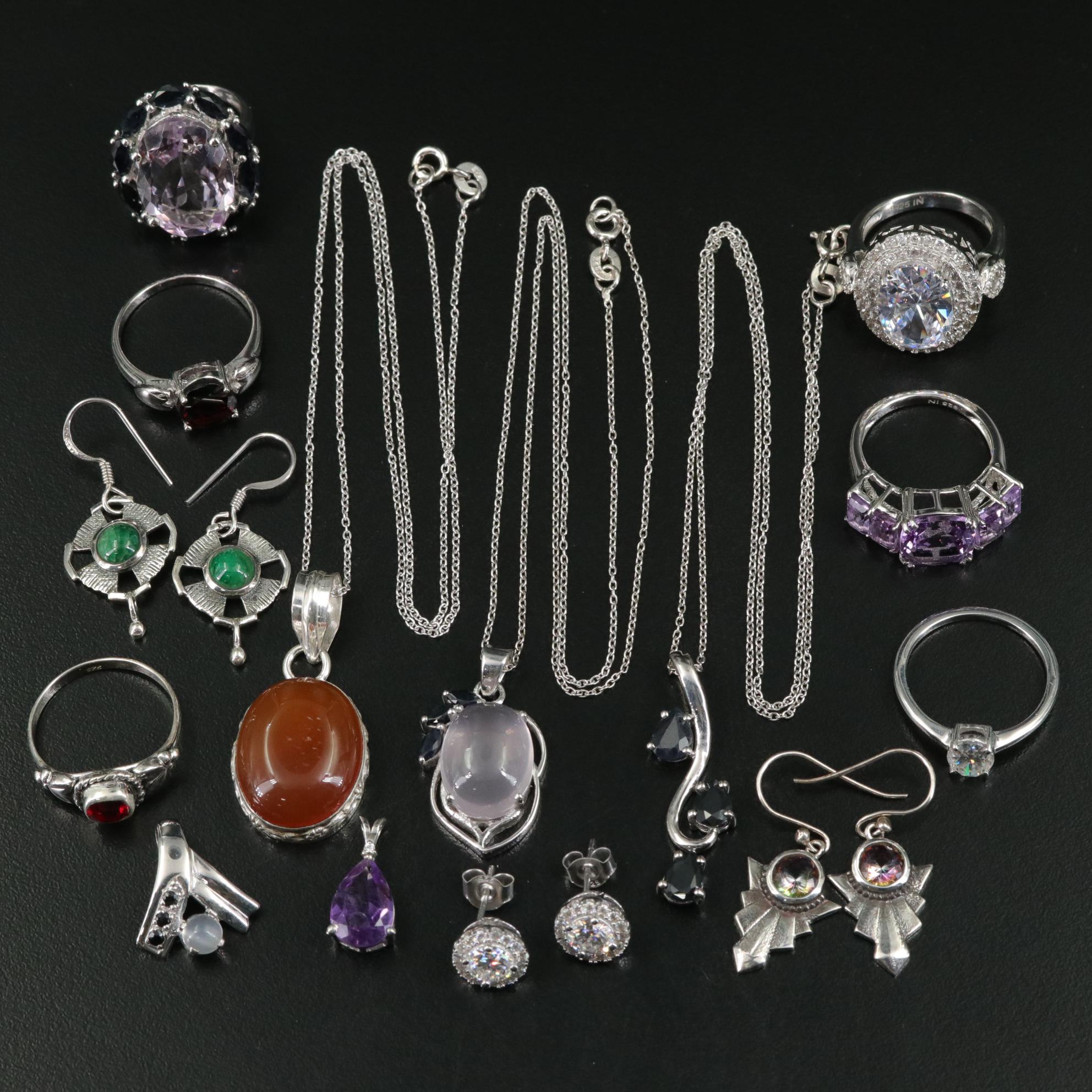 Group of 14 Assorted Sterling Silver Rings, Necklaces, Earrings, and Pendants