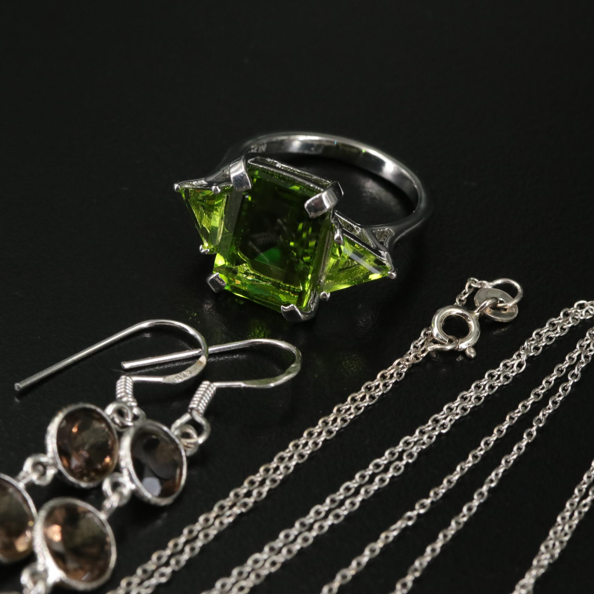 Group of 14 Assorted Sterling Silver Rings, Necklaces, Earrings, and Pendants