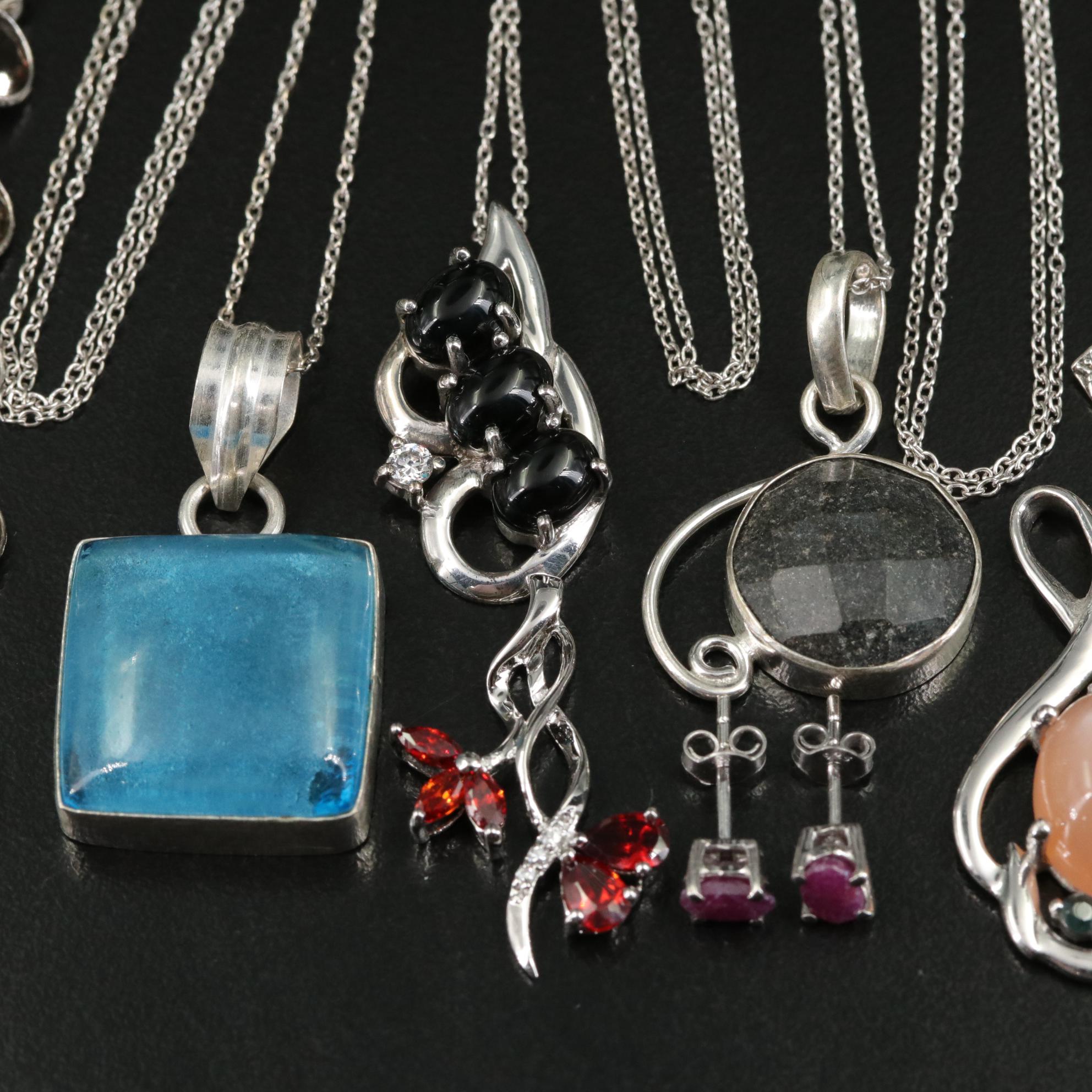 Group of 14 Assorted Sterling Silver Rings, Necklaces, Earrings, and Pendants