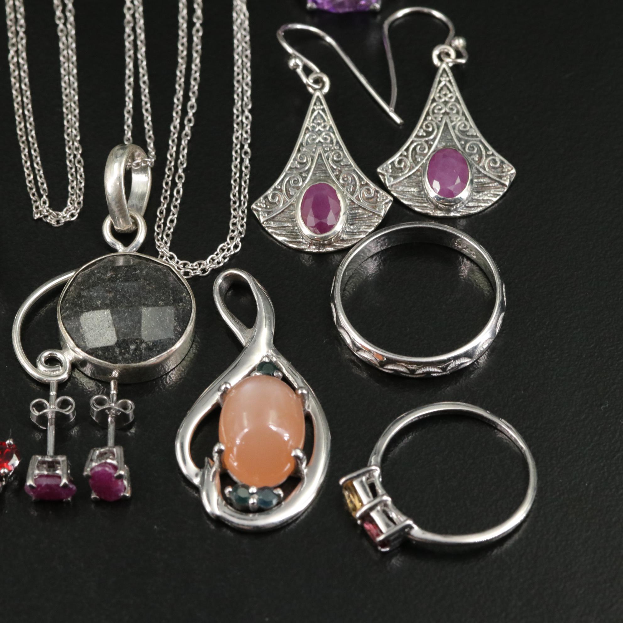 Group of 14 Assorted Sterling Silver Rings, Necklaces, Earrings, and Pendants