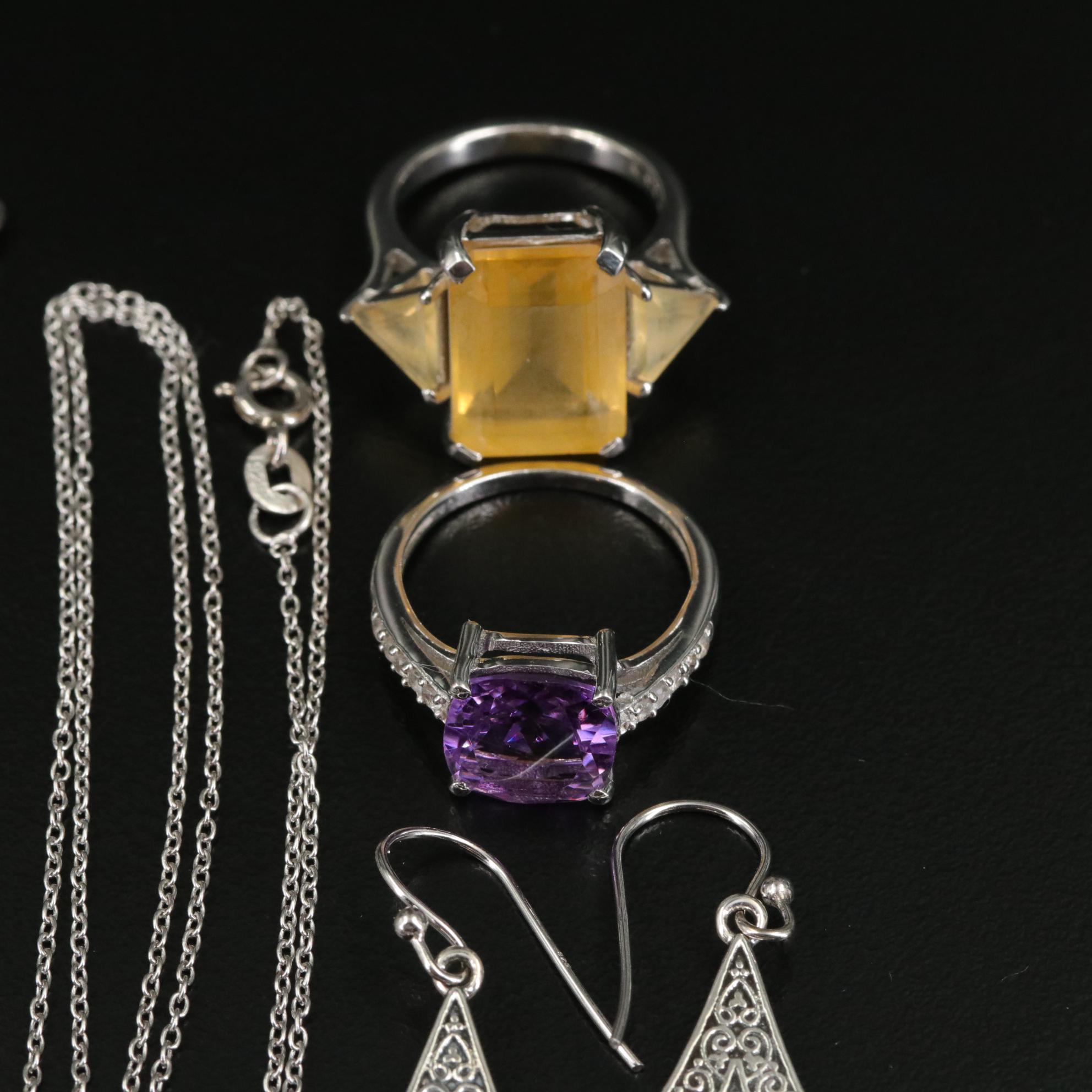 Group of 14 Assorted Sterling Silver Rings, Necklaces, Earrings, and Pendants